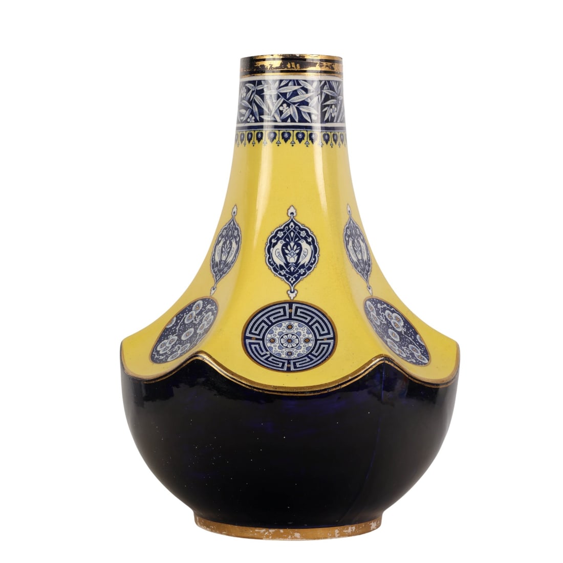 Minton English Porcelain Blue White & Yellow Vase: Antique Minton English porcelain blue and white and yellow vase with a flared lower body and tall cylindrical neck, decorated with circular medallions, foliate motifs, and patterned borders