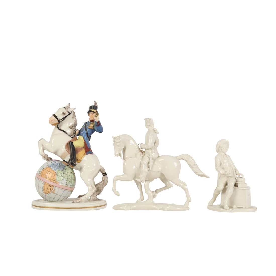 Nymphenburg German Porcelain Equine Figurines LOT: Lot of three Nymphenburg, Germany porcelain figurines, including two white-glazed figures and one polychrome-decorated rider on a rearing horse atop a globe. Each is marked on the underside with the