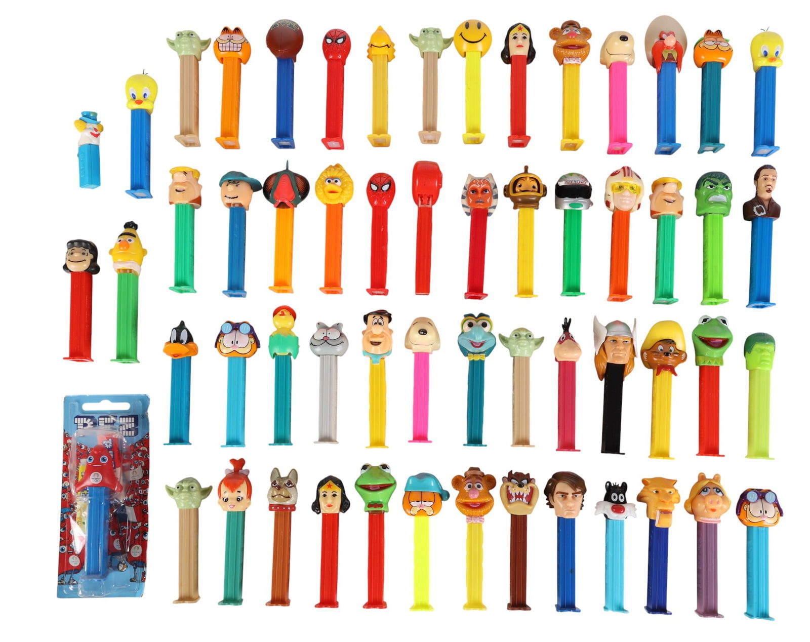 Star Wars Marvel Looney Tunes Pez Dispenser 50+LOT: Assortment of approximately fifty plus character Pez candy dispensers featuring pop culture icons from cartoons, comics, and film. Characters include Star Wars (Yoda, Luke Skywalker, Ahsoka, others),