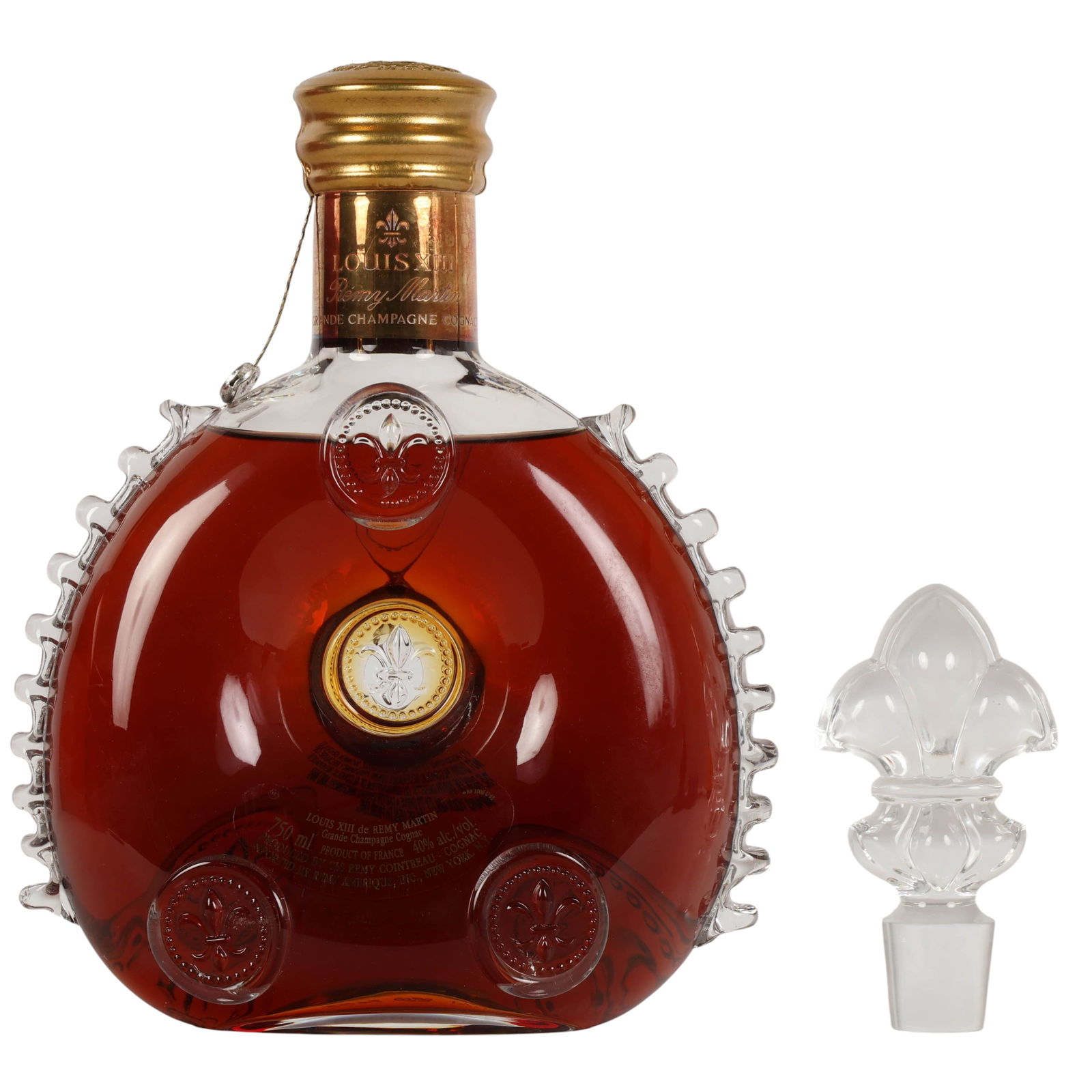 Baccarat Louis XII Remy Martin Sealed Box Decanter: Baccarat crystal decanter of Louis XIII Remy Martin Grande Champagne Cognac, sealed and unopened. The decanter is housed in its original red presentation box with a branded outer carrying case. Label