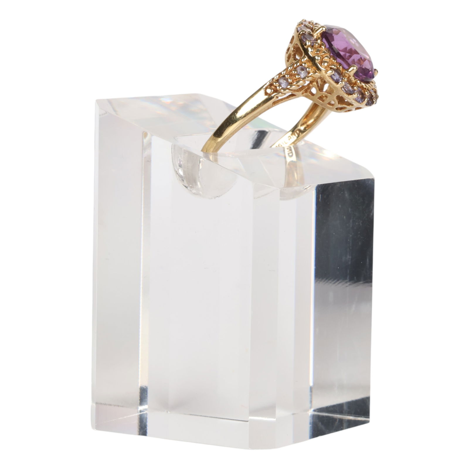 14K Yellow Gold Amethyst Tanzanite Halo Ring Sz 10: 14K yellow gold ring centered with a faceted oval purple amethyst, framed by a halo of round violet blue tanzanites. The shoulders feature openwork filigree detailing that flows into a polished band.