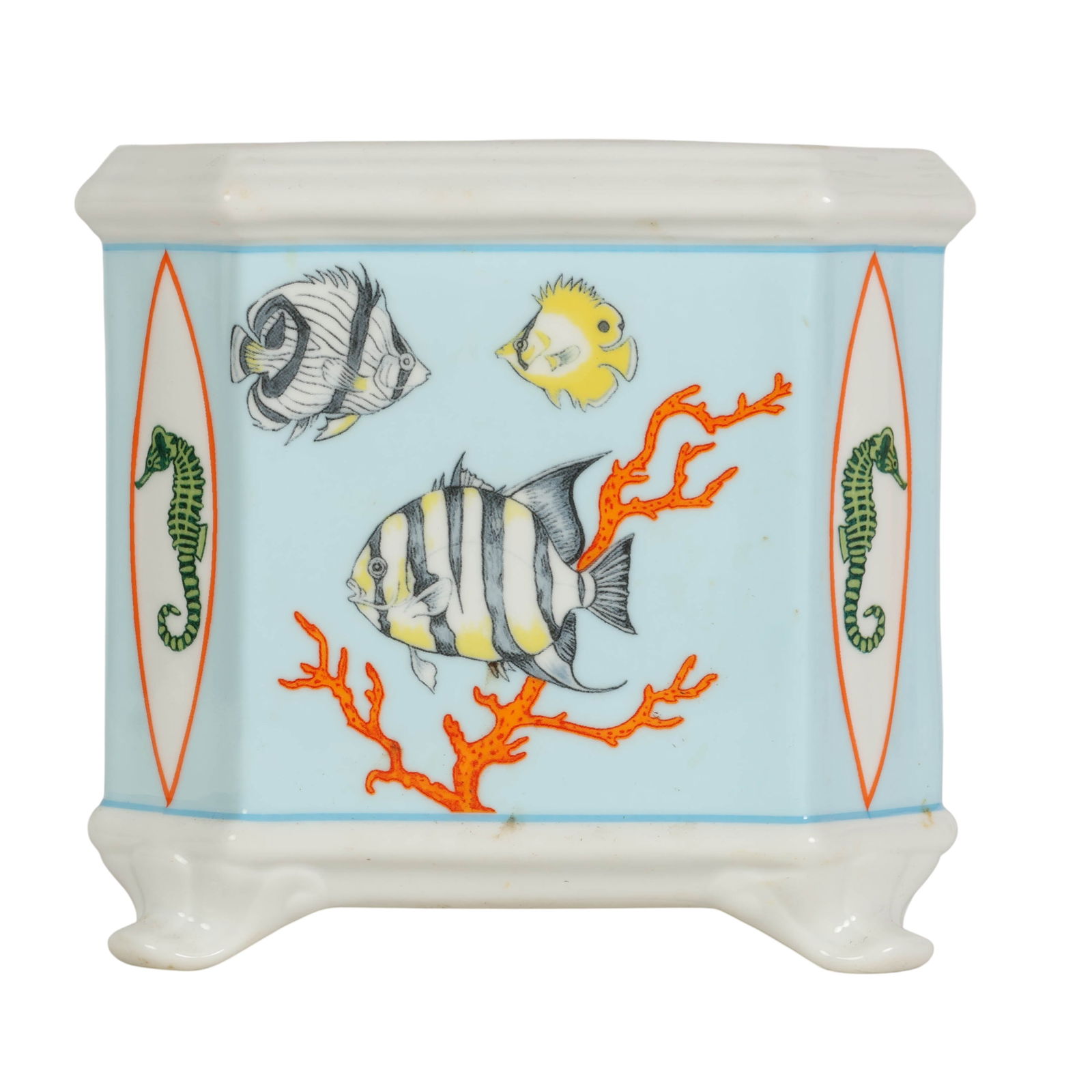 Lynn Chase Reef Tropical Fish Porcelain Planter: Lynn Chase Design Inc. Reef pattern planter cachepot, Production years 1994-1996. Decorated with colorful tropical fish and coral motifs on a pale blue ground, accented with 24 karat gold. Elevated on