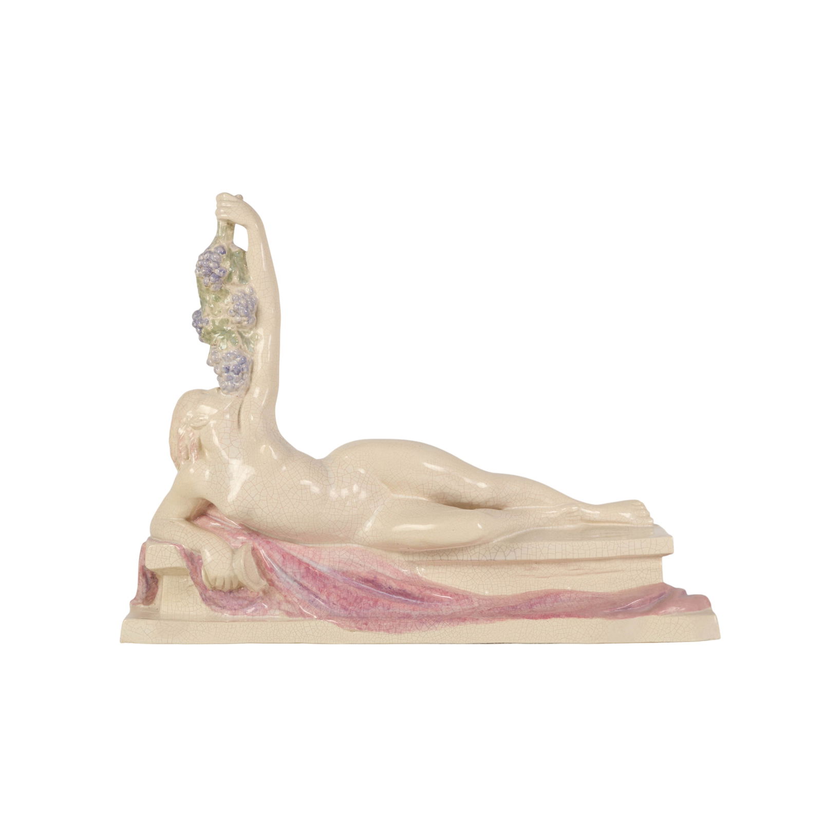 Edition Kaza French Ceramic Classical Bacchic Nude: Edition Kaza French glazed ceramic figural sculpture depicting a reclining bacchante nude female in the Art Deco style, posed atop draped fabric, with one arm raised overhead holding a leafy grape