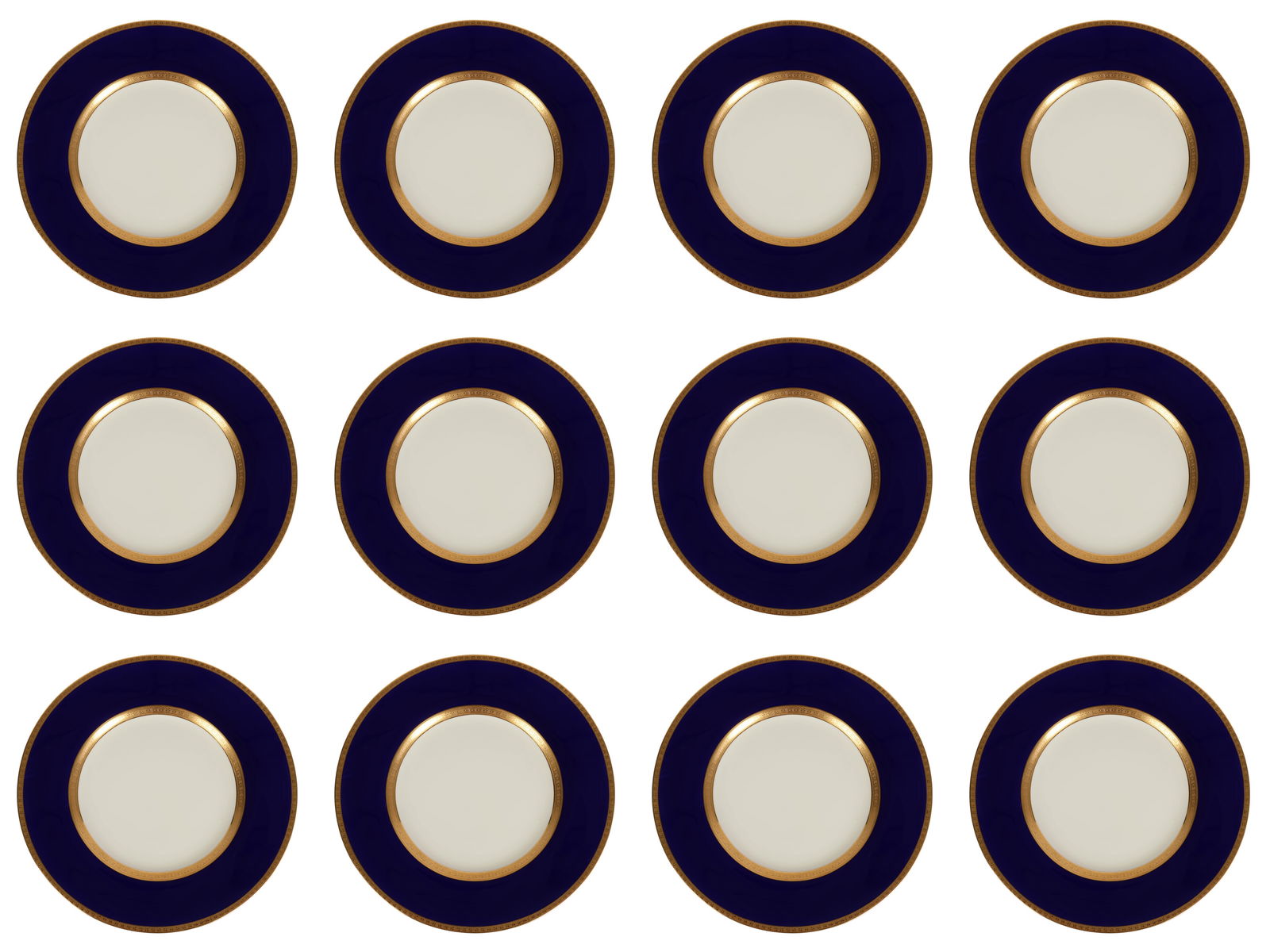 Tiffany Co Minton Blue Gold Gilt Dinner Plates 12p: Tiffany & Co New York, set of twelve porcelain dinner plates produced by Minton of England. Each plate features a rich cobalt blue border embellished with gilt decoration, including gold bands that