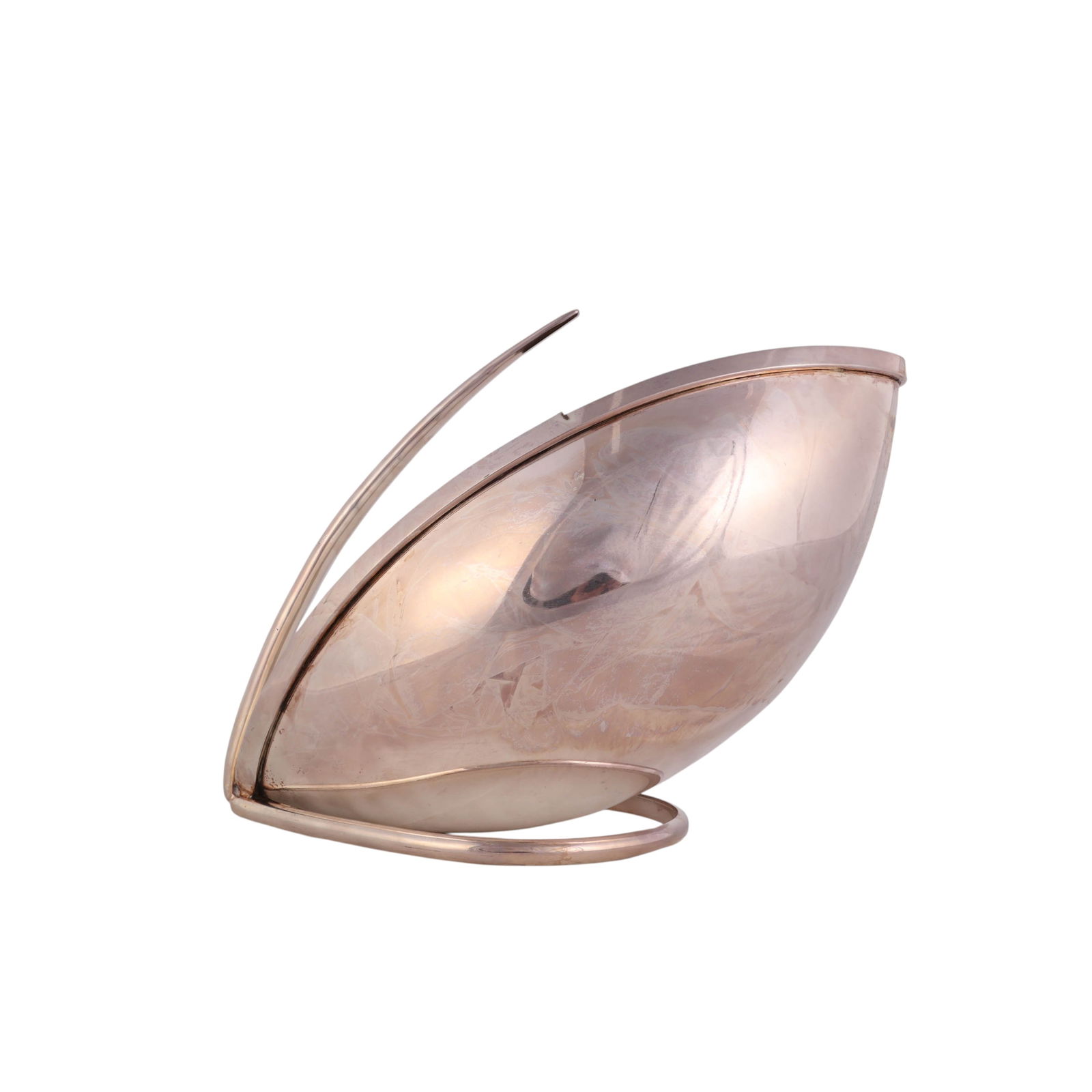 Art Deco Style Sculptural Wine Bottle Holder Stand: Art Deco-style silver plate wine bottle caddy designed in a sleek, streamlined form featuring an angled cradle to hold a single bottle and an integrated arched handle for easy transport. The minimalis