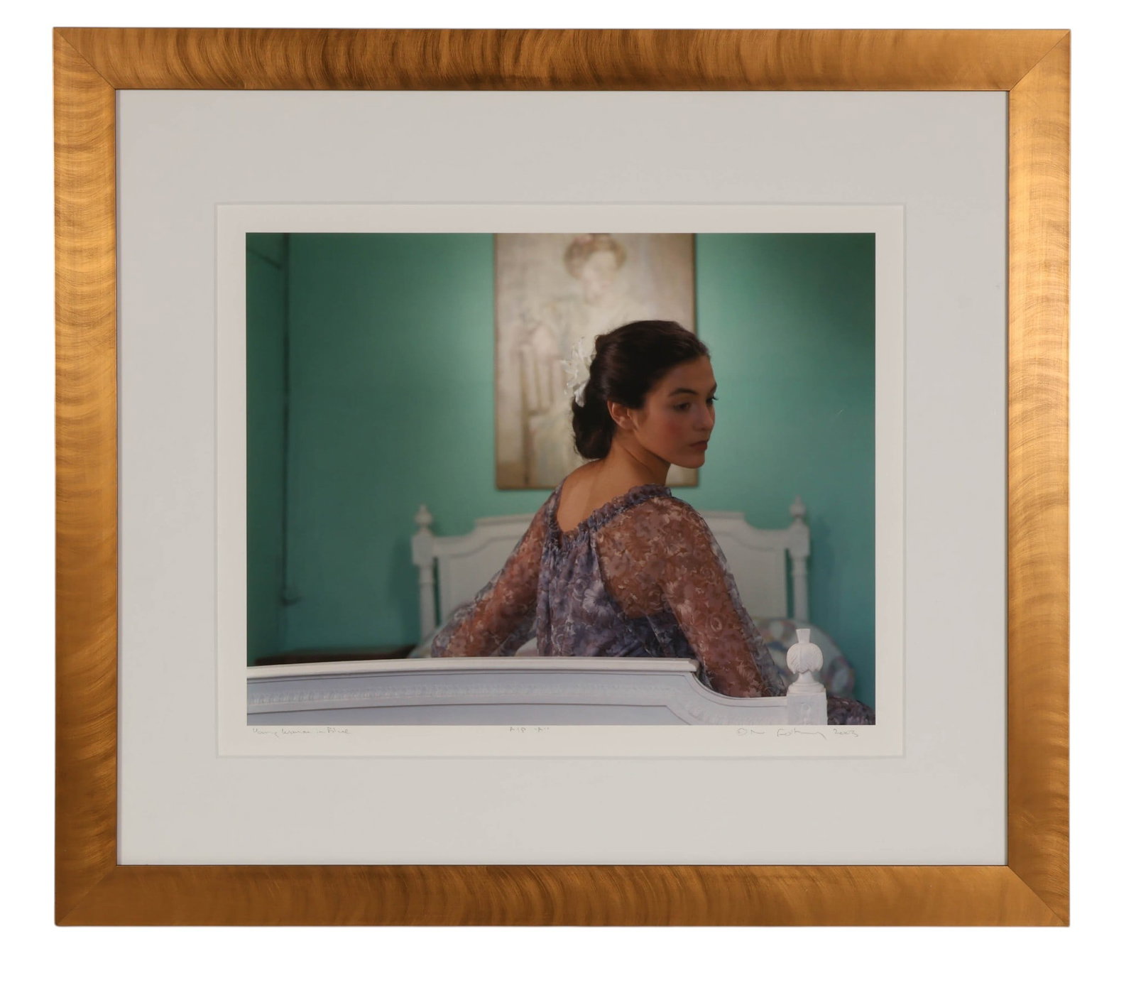 Neil Folberg b.1950 Young Woman in Blue SIGNED: Neil Folberg (American-Israeli, born 1950), Young Woman in Blue, 2003, archival pigment photograph on paper, depicting a contemplative female figure seated on a bed within an interior setting. The com