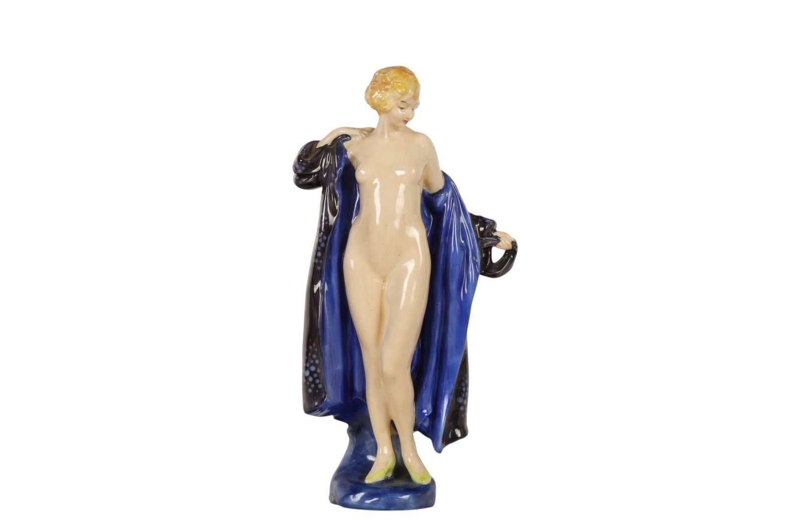 Royal Doulton The Bather HN687 Nude Lady Figurine: Royal Doulton English hand painted porcelain The Bather HN687 figurine. Designed by Leslie Arthur Harradine (British, 1887-1965). The Art Deco figurine depicts a young woman putting on a blue robe. Pr