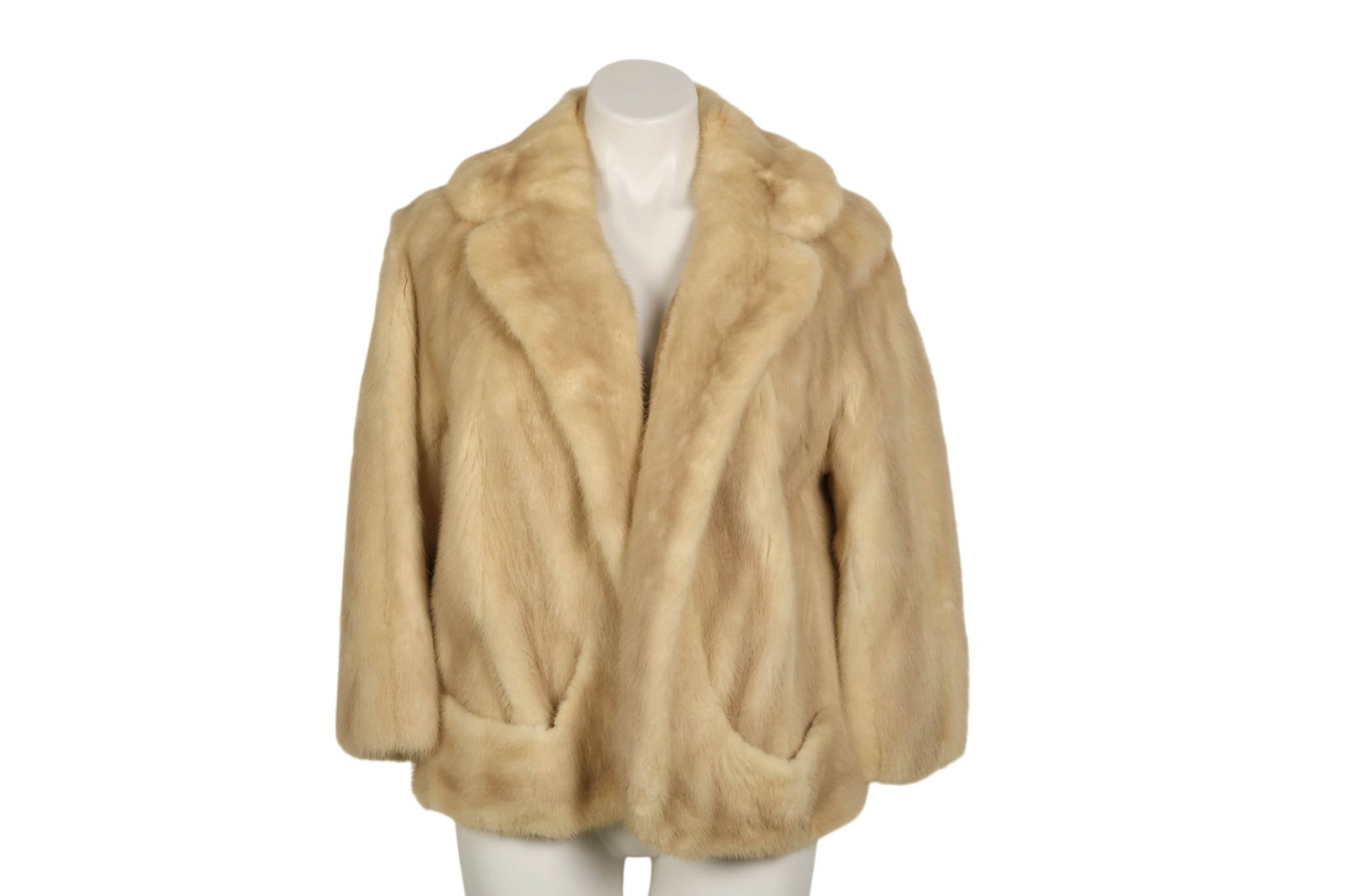 Vintage Ladies Dr. John Blonde Rabbit Fur Jacket: Vintage ladies fur jacket by Dr. John crafted from blonde beige rabbit. The piece features a short length silhouette with a collar and two front pockets. Measurements are approximately 26" in length, 