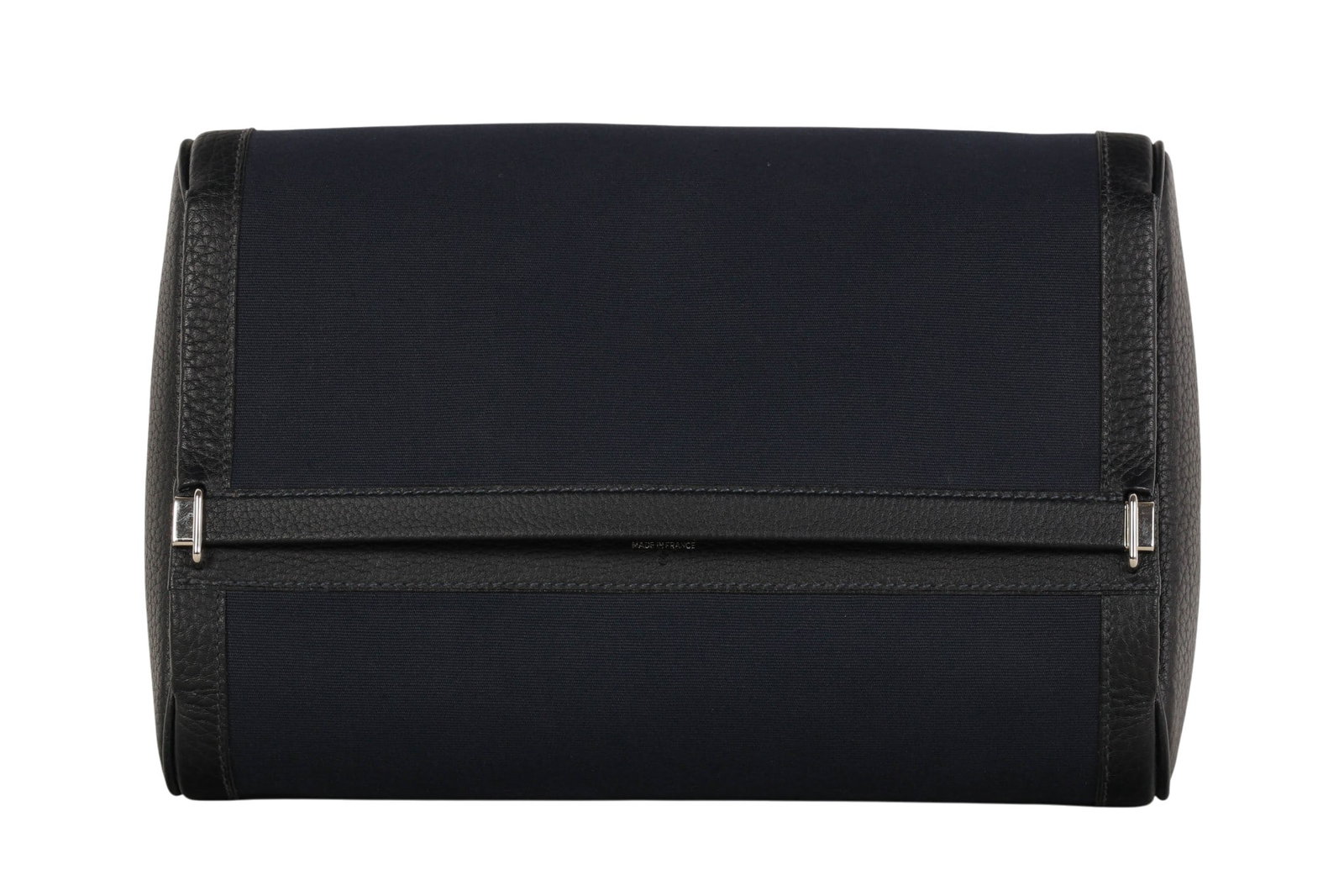 Hermes Paris Canvas Leather Designer Travel Pouch: Hermes Paris France, designer luxury canvas and leather clutch travel bag featuring a structured fold over design with grained leather trim and silver tone hardware accents. The minimalist form highli