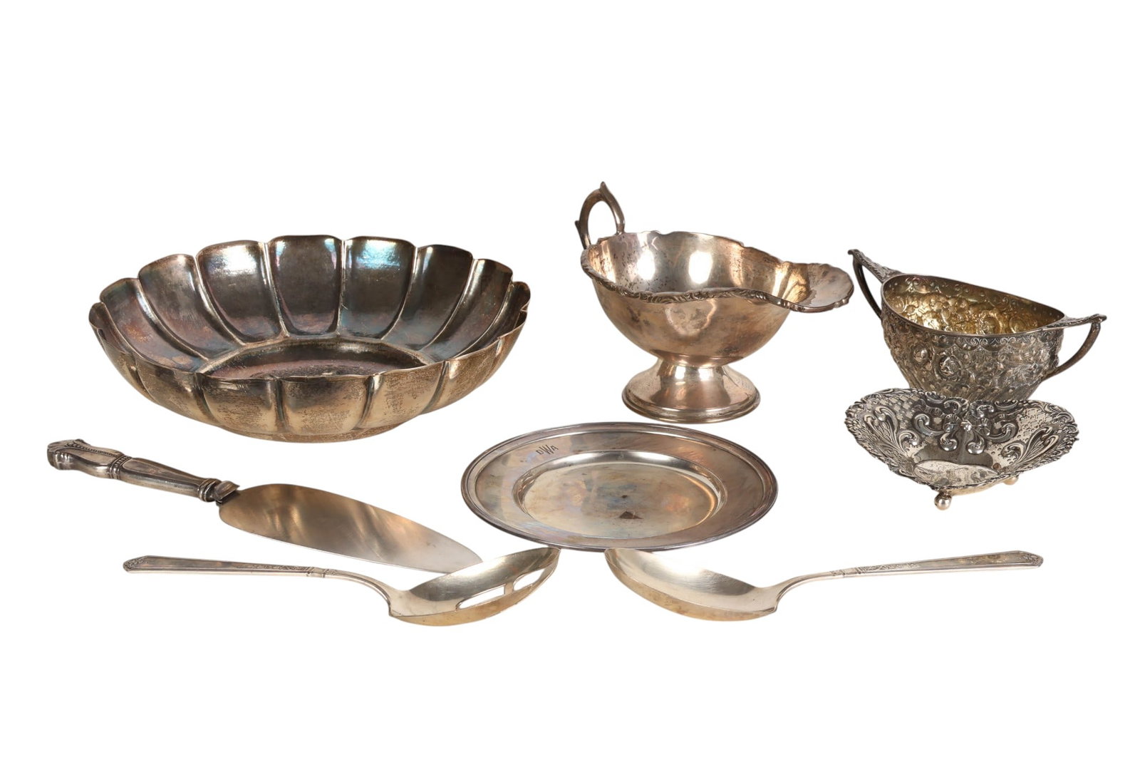 Sterling Silver Bowls Dishes Utensils LOT 1,400g.: An 8-piece sterling silver estate lot including a Mexican hammered silver bowl with a lobed rim, a Tiffany and Co. Makers bread and butter plate, a Gorham pierced heart-form dish with ornate scrolling