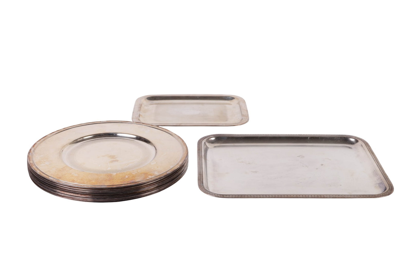Christofle Silverplate Trays and Servers 16pc. LOT: Christofle French silverplate thirteen piece serve ware set including two rectangular trays-one with an engine turned surface and the other with a gadrooned rim-alongside a set of eleven charger or se