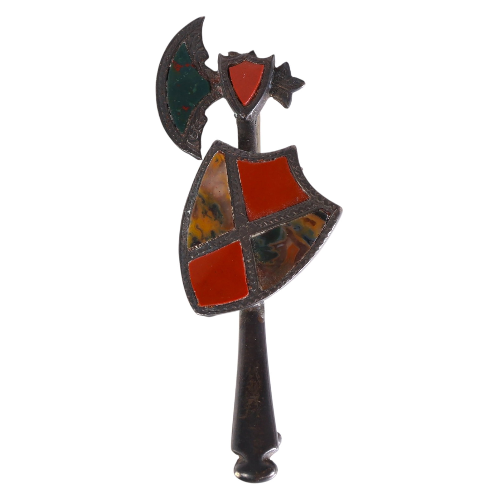 Antique Scottish Sterling Jasper Shield Pin SIGNED: Antique Scottish sterling silver brooch in the form of a ceremonial axe and heraldic shield, set with panel inlays of polished red jasper, green agate, and mottled multicolor stone. The reverse is eng