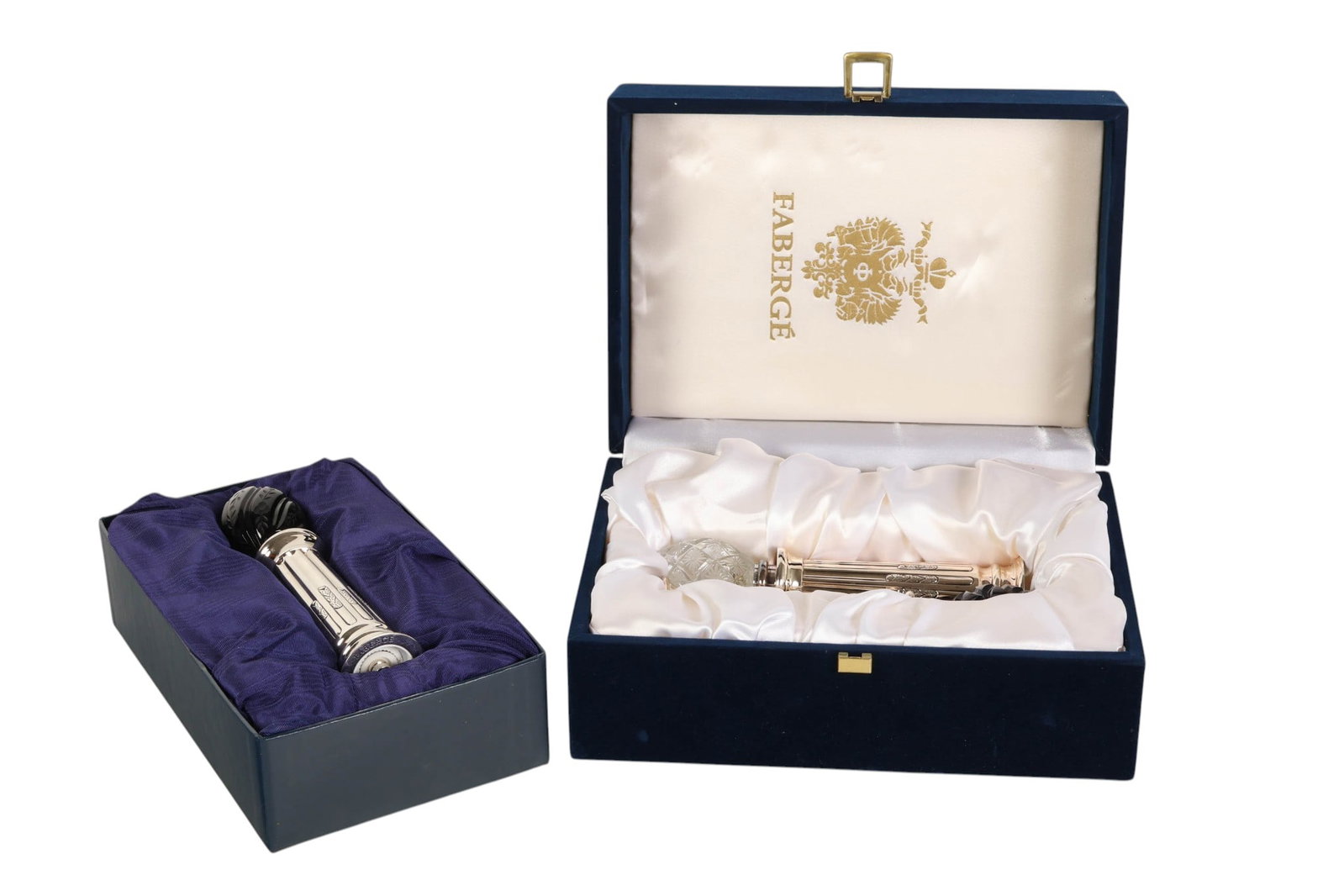 Faberge Imperial Crystal Egg Salt Pepper 3pc. SET: Three Faberge salt and pepper grinders from the Imperial Collection, featuring fluted silver tone columnar bodies topped with decorative egg form finials in cut crystal and colored glass. The set