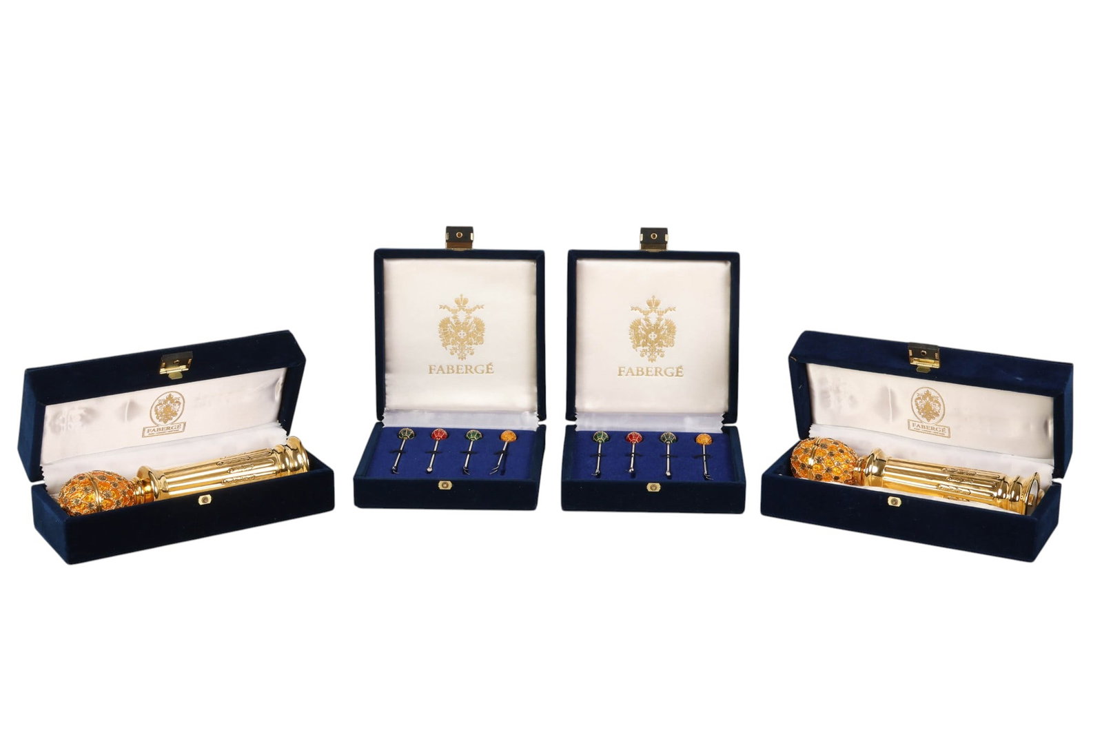 Faberge Hors Doeuvre Forks Crystal Egg Grinder LOT: Faberge table accessory lot from the Imperial Collection, comprising a box with a pair of salt and pepper grinders, each measuring approximately 8" x 2" x 2", featuring fluted columnar bodies topped