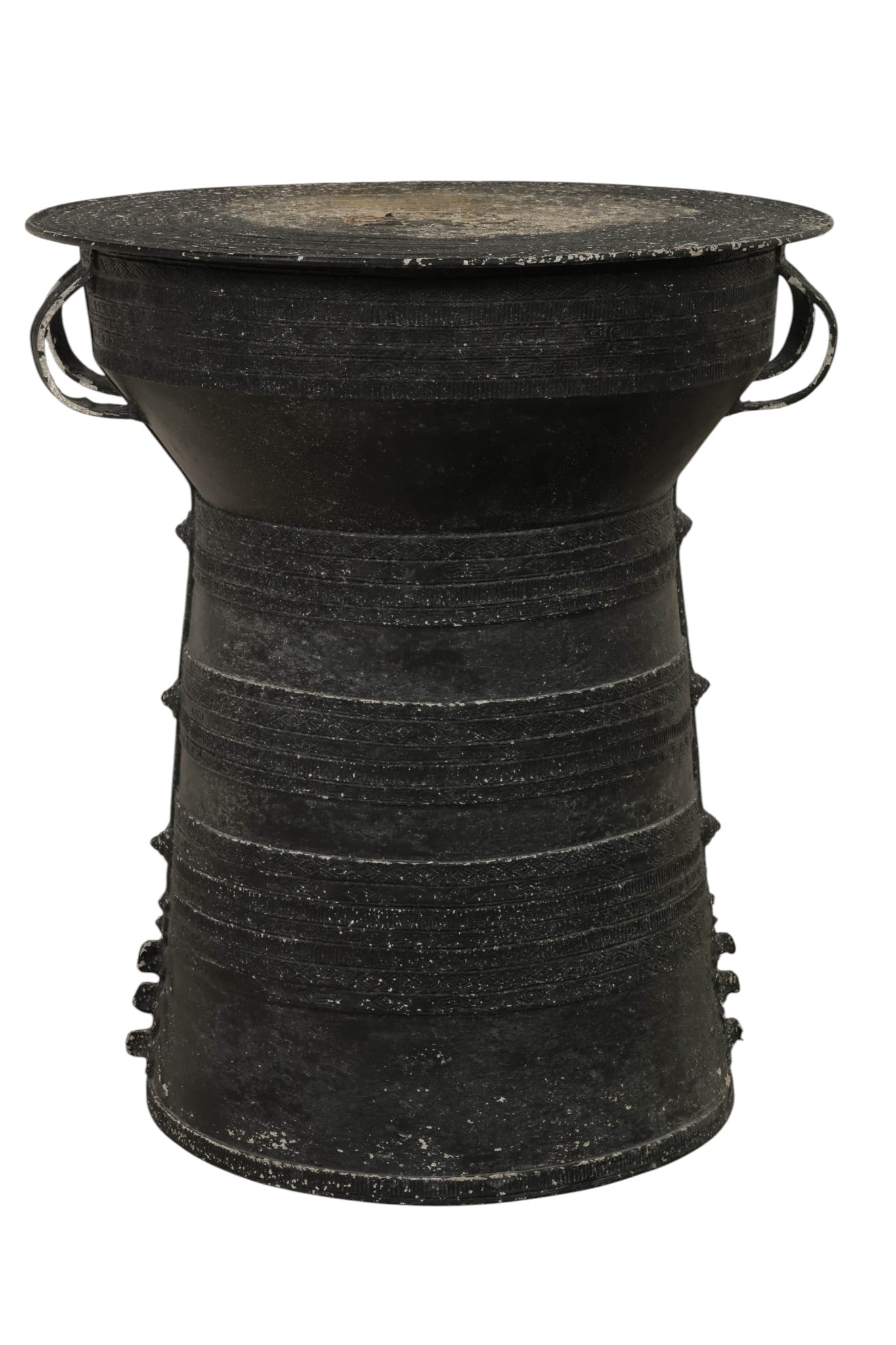 African Cast Etched Bronze Tribal Rain Drum Table: African bronze rain drum form table featuring a flared circular top over a tapered cylindrical body with integrated side handles. The surface is richly decorated with repeating geometric and tribal-in