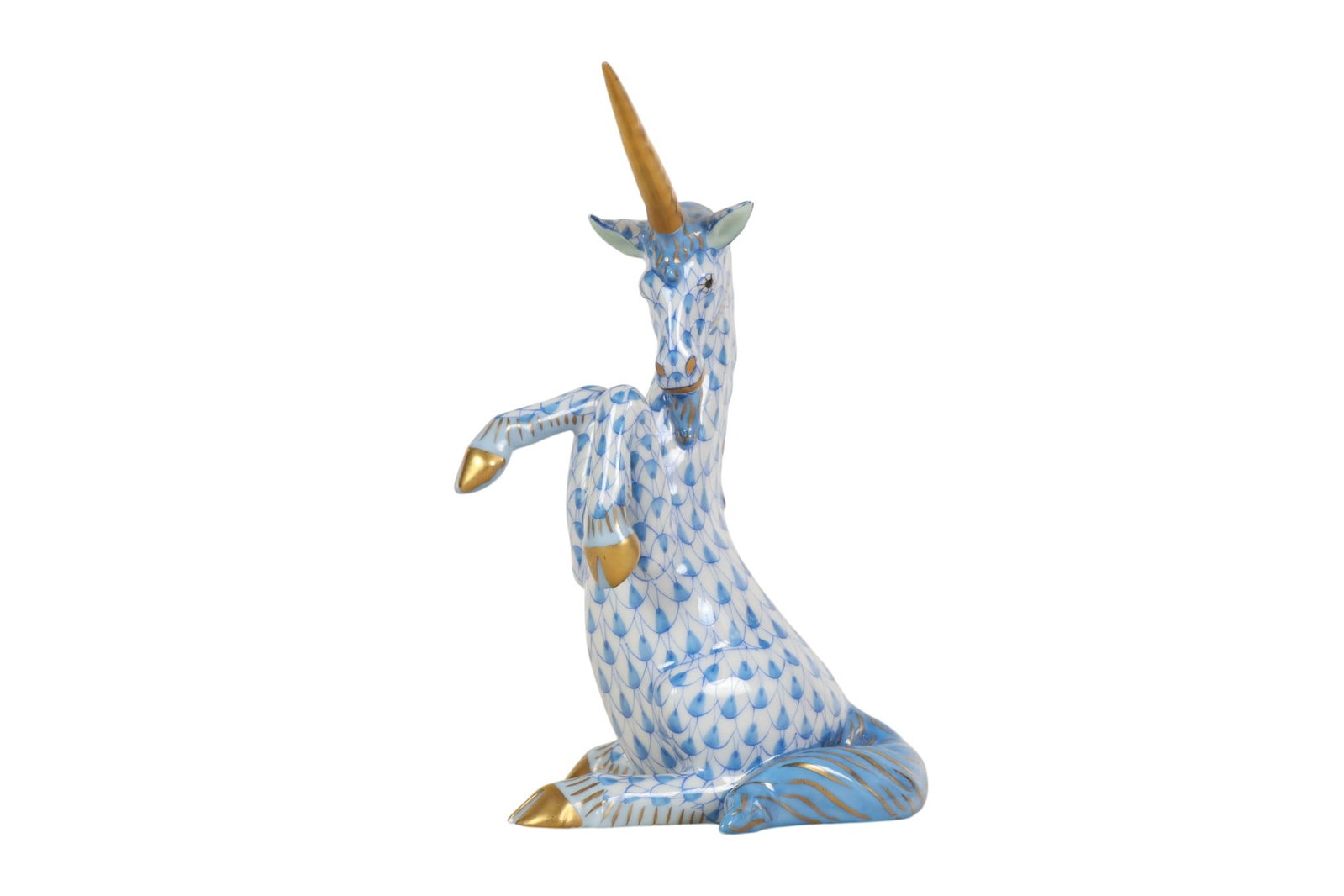 Herend Unicorn Blue Fishnet Porcelain Figurine: Herend Hungary hand-painted porcelain unicorn figurine. The rearing mythical creature showcases the signature fish-scale pattern in a blue coloration across the body, with a flowing mane and tail acce