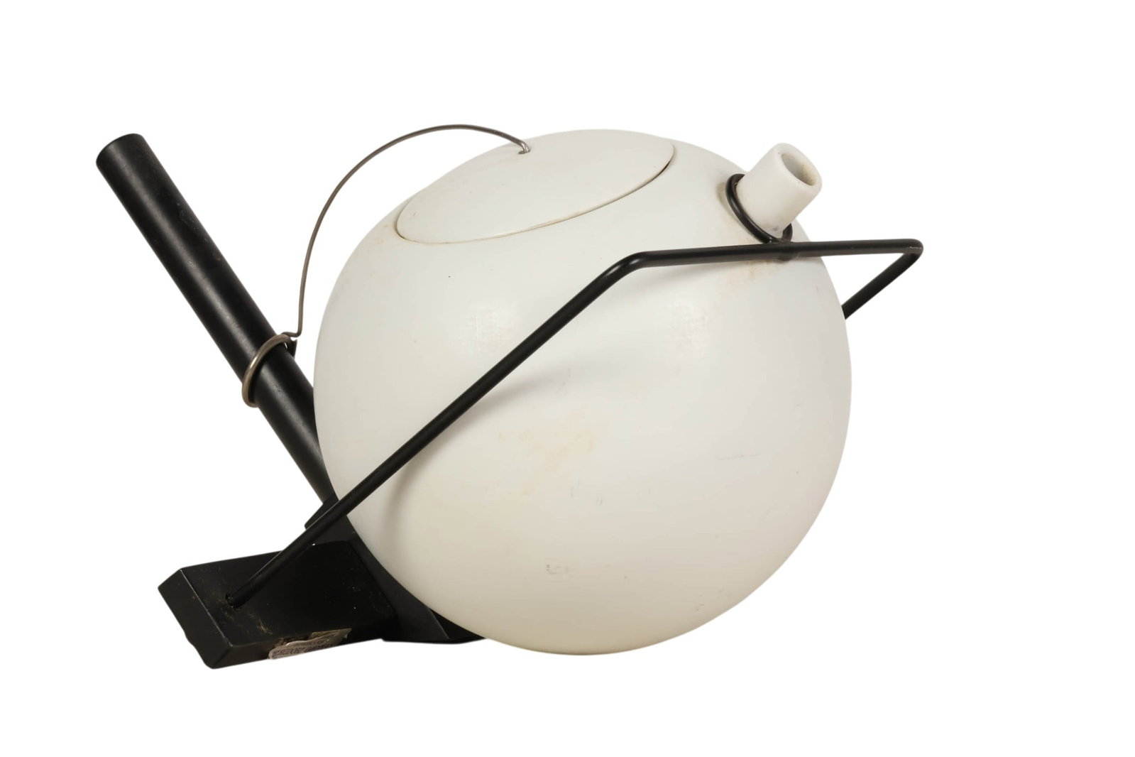 Jean Philippe Baudry b.1943 Modern Ceramic Teapot: Jean Philippe Baudry (French, born 1943), modernist teapot featuring a minimalist geometric form with a spherical white glazed ceramic vessel fitted with lid and spout, supported within a black metal 
