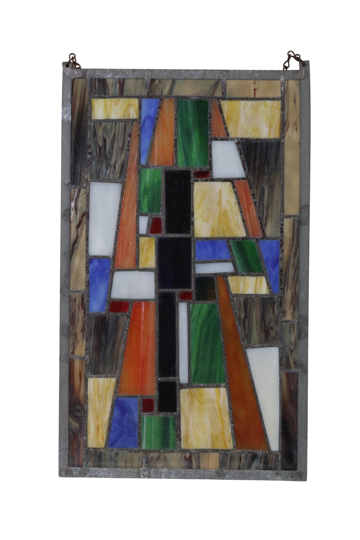 Multi-Colored Geometric Design Stained Glass Panel: Vintage stained glass window panel composed of multicolored opalescent and textured glass pieces set within a metal frame. The design features intersecting angular geometric forms in shades of green, 