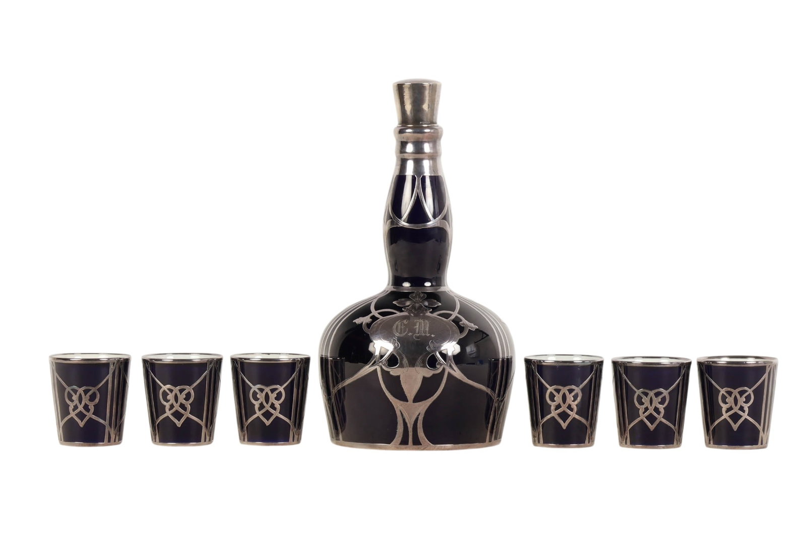 Limoges Lenox Overlay Porcelain Decanter and Cups: Limoges and Lenox assembled set in cobalt blue porcelain, featuring a fine silver overlay Lenox decanter with flowing Art Nouveau style motifs. The elongated neck is adorned with intricate scrolling a