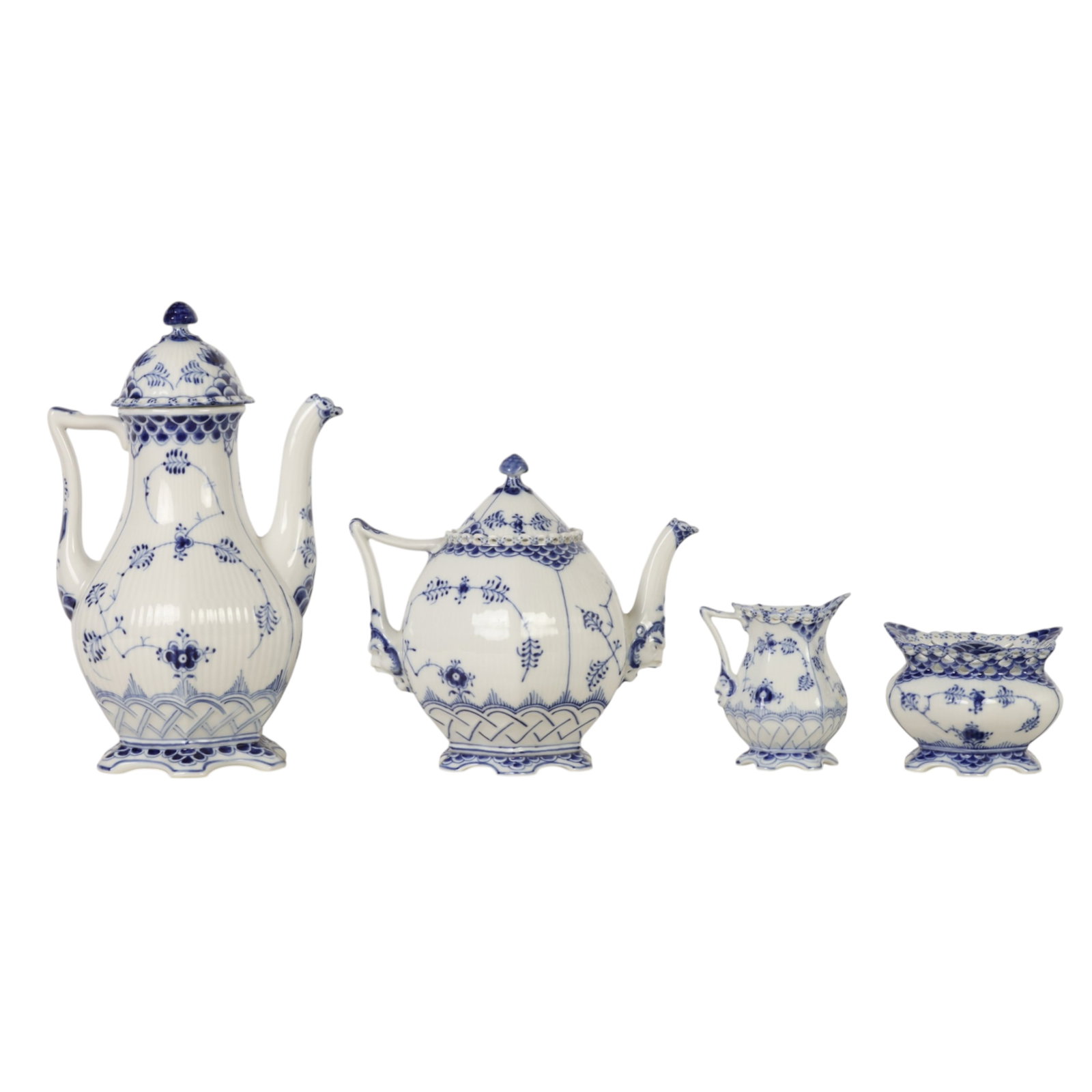 Royal Copenhagen Blue Fluted Full Lace Tea Set 4pc: Royal Copenhagen Denmark, a Blue Fluted Full Lace No Trim pattern group including a lidded teapot, coffee pot with lid, open sugar bowl and milk creamer jug. The decoration is characterized by a hand 