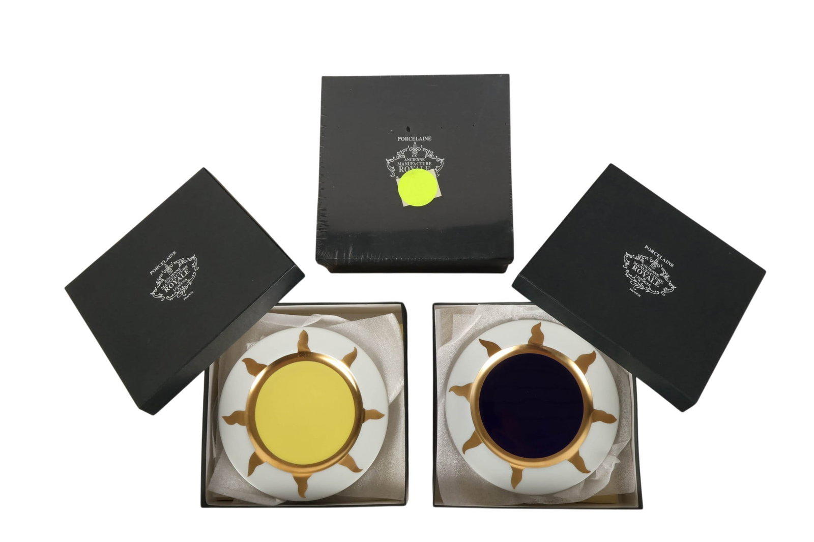 Marcial Berro x Royale de Limoges Heliso Plate SET: Set of twelve Royale de Limoges porcelain plates in the Decor Helios pattern designed by Marcial Berro, featuring bold central color fields in assorted tones including green, blue, yellow, and red, en