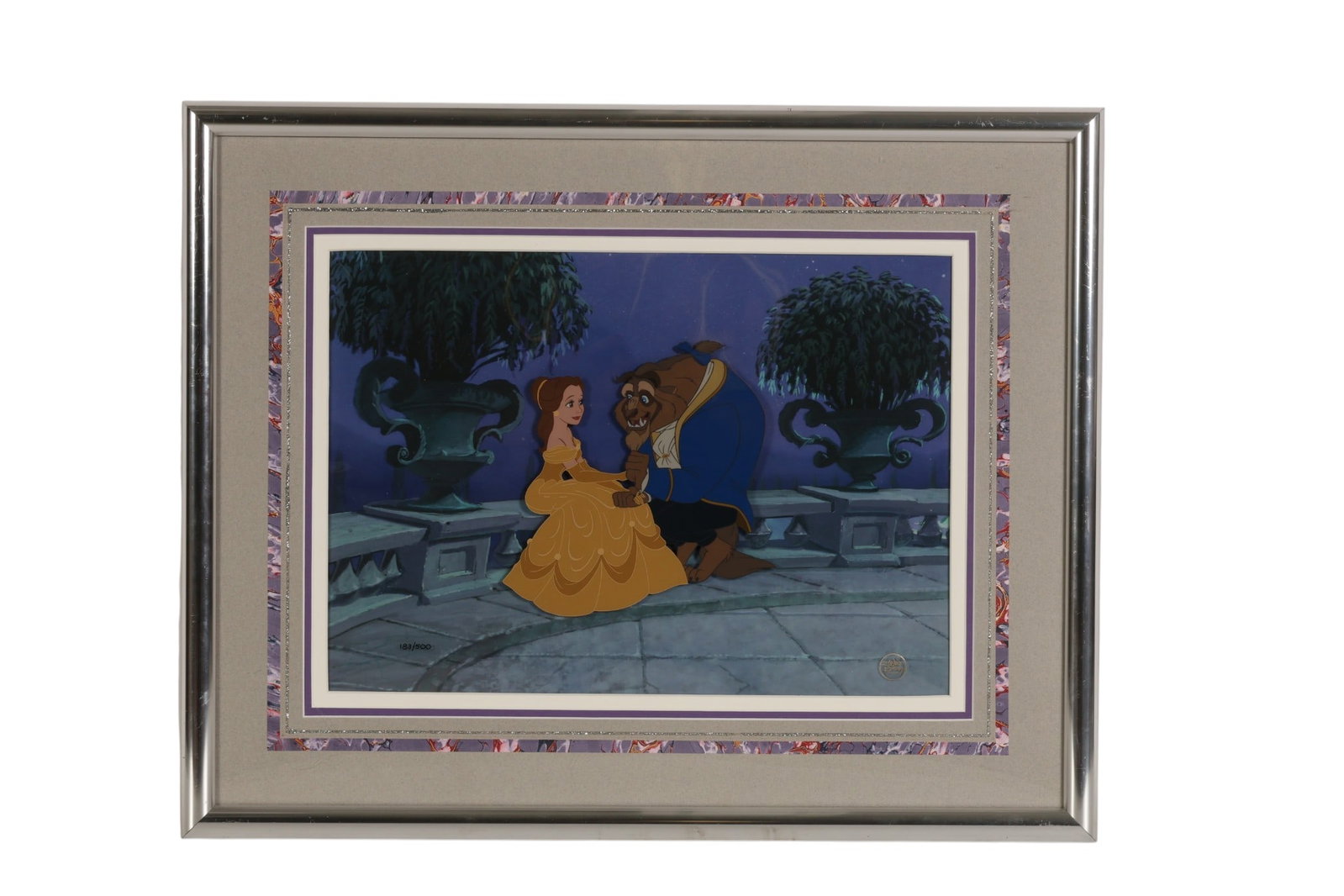 Walt Disney Beauty & The Beast Animation Cel w COA: Walt Disney Company, limited edition painted animation cel depicting Belle and Beast seated together in a garden scene setting from "Beauty and the Beast." Numbered 183/500 lower left with Disney Comp