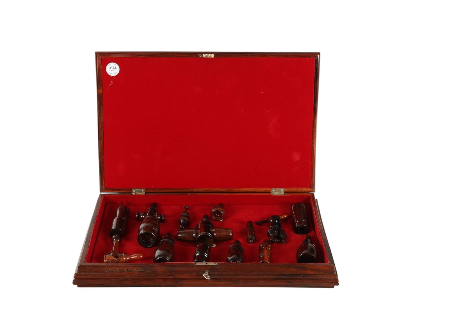Maurilio Coelho Wood Bird Whistle 17pc ESTATE LOT: Collection of 17 Maurilio Coelho handcrafted bird hunting calls housed in a fitted wooden presentation case with red felt lining. The assortment includes a variety of turned wood and mixed-form whistl