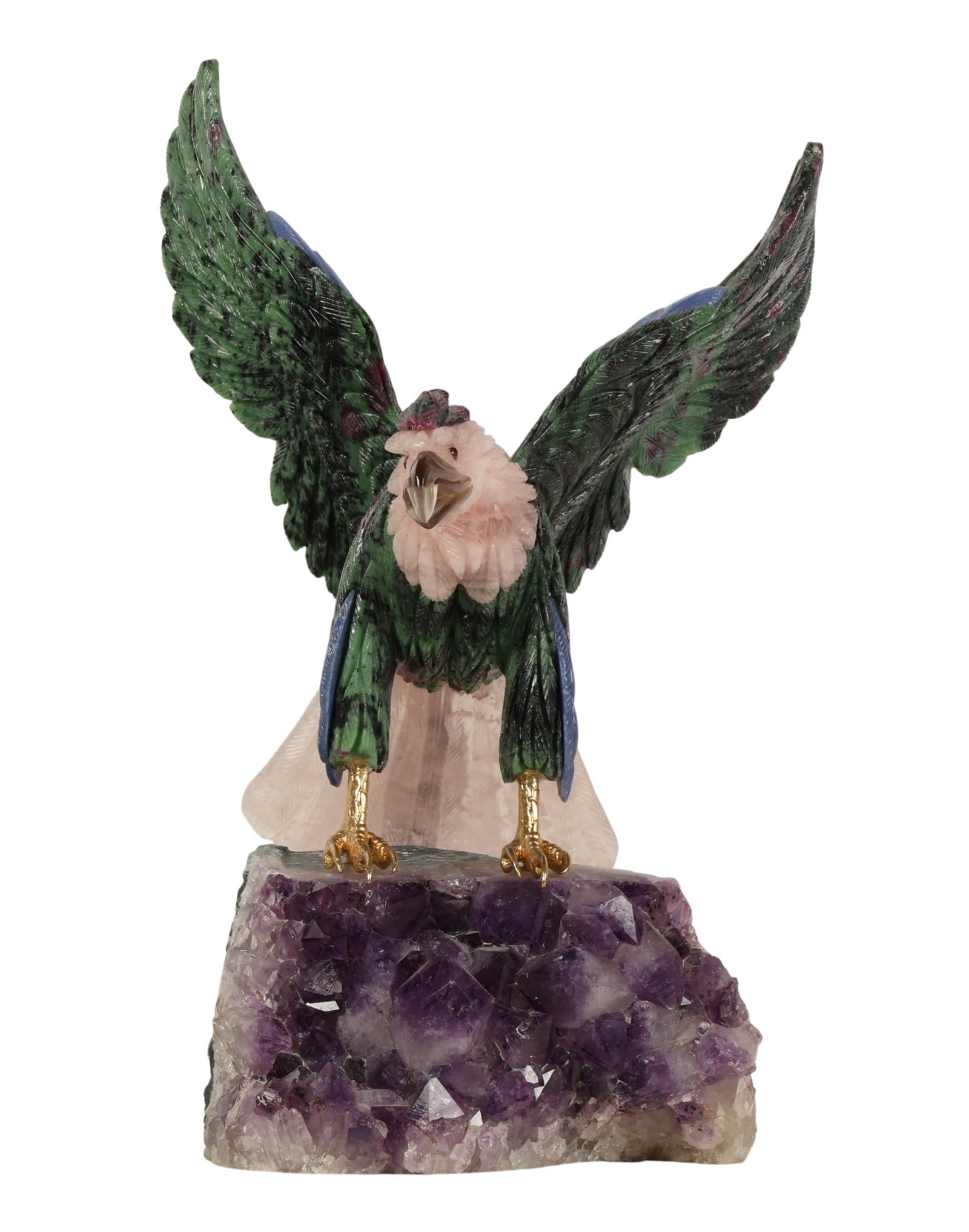 Carved Gemstone Eagle Sculpture on Amethyst Base: Brazilian style Natural mineral hardstone carving of a hawk bird of prey figure, featuring outstretched wings composed of ruby zoisite with accents of lapis lazuli, and a carved rose quartz stone head
