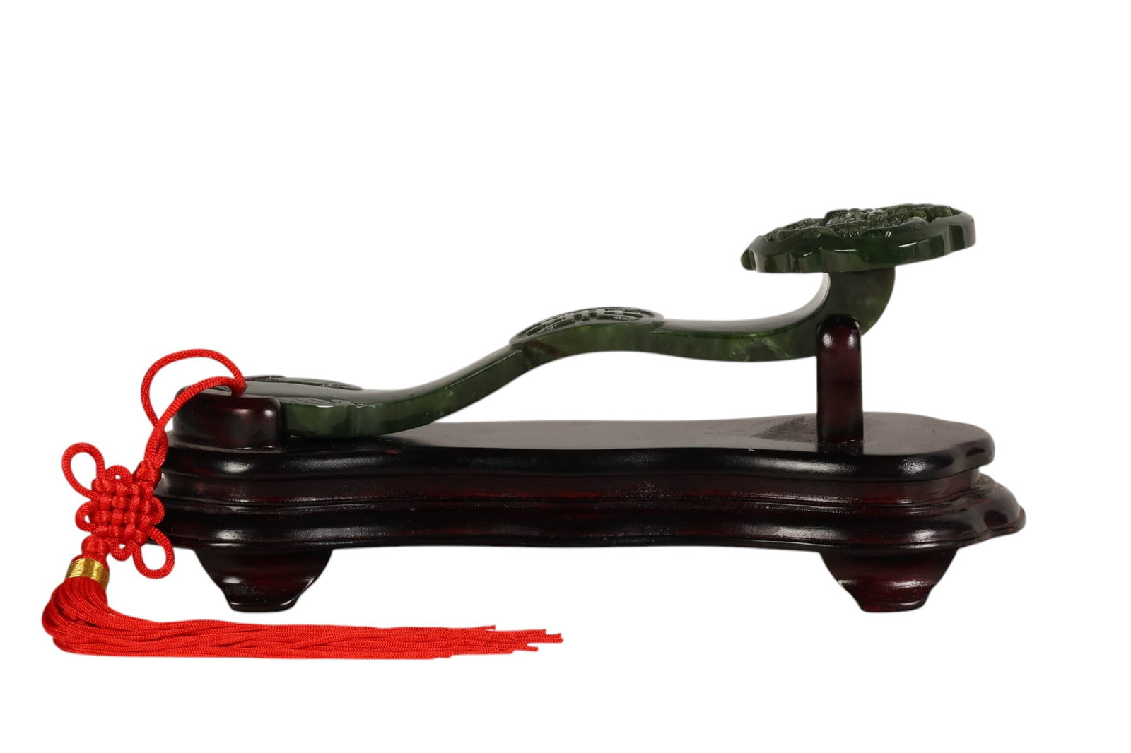 Chinese Carved Spinach Jade Dragon Ruyi Scepter: Chinese spinach jade ruyi scepter, finely carved in deep green stone with a lustrous polished surface, featuring a prominent ruyi head decorated with a high-relief dragon amid scrolling clouds. The sh