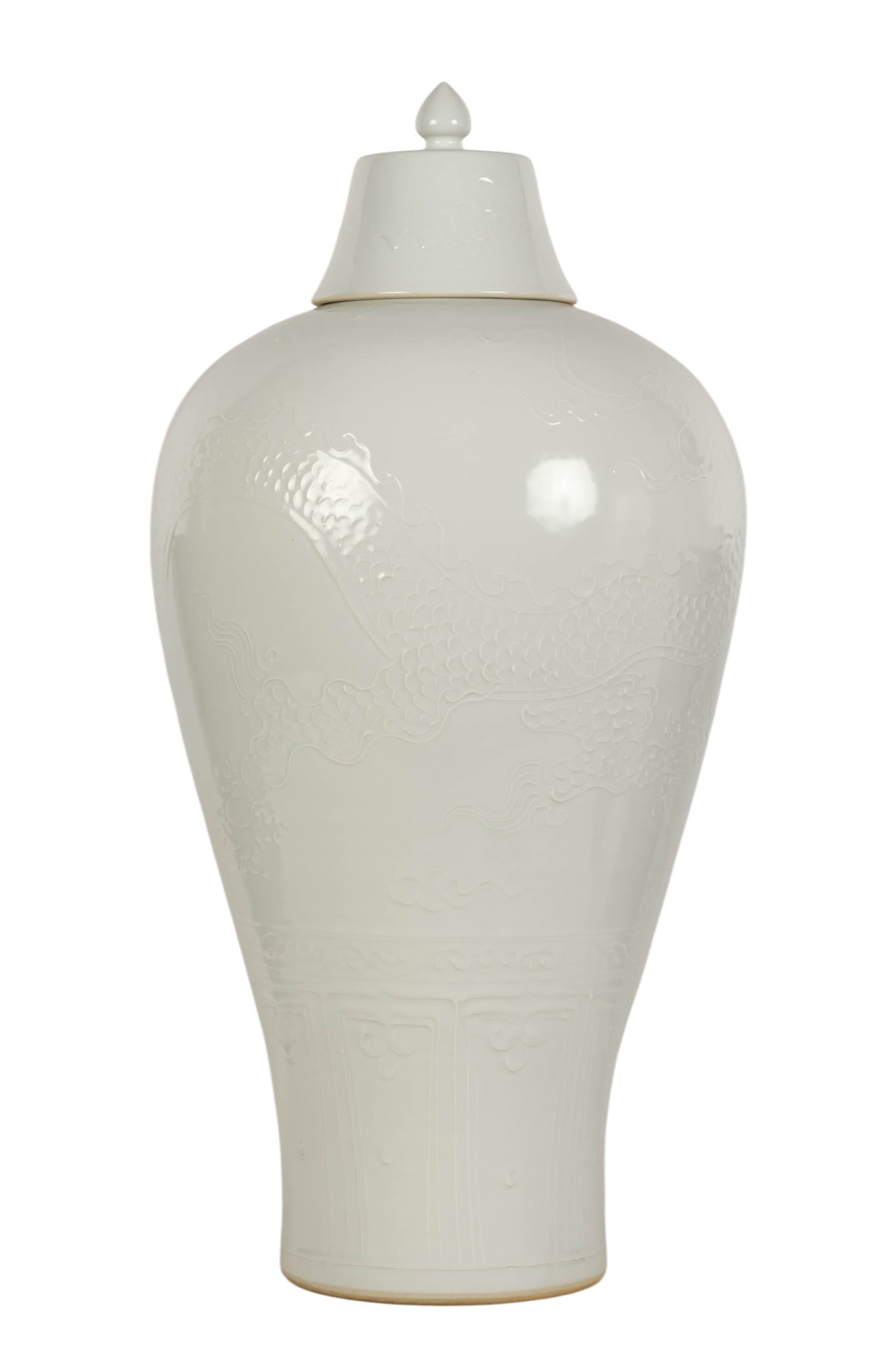 Chinese Blanc de Chine Porcelain Dragon Floor Vase: Chinese Blanc de Chine porcelain floor vase with lid featuring an elegant baluster form with narrow neck and fitted domed lid topped by a finial knob. The vase is finely decorated in relief with a fiv