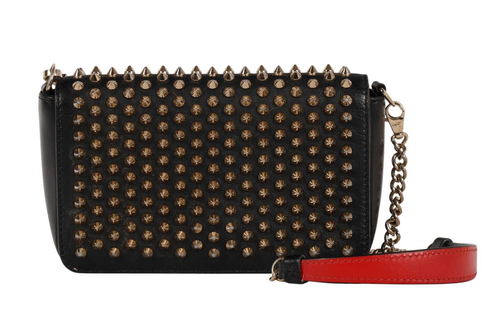 Christian Louboutin Zoompouch Spiked Clutch w BOX: Christian Louboutin Zoompouch crossbody clutch crafted in black leather and extensively embellished with signature gold-tone metal spike studs throughout the exterior. The bag features a slim rectangu