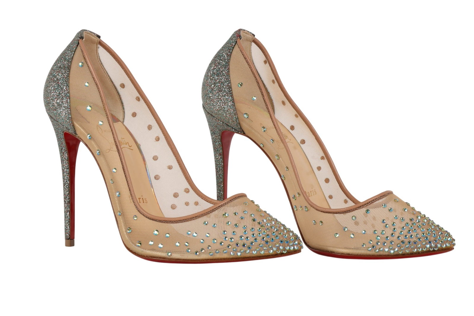 Christian Louboutin Follies Strass Stilettos Sz 37: Pair of Christian Louboutin Follies Strass pumps featuring nude illusion mesh uppers embellished with sparkling rhinestones, along with glittered pointed toes and heels. The elegant silhouette is