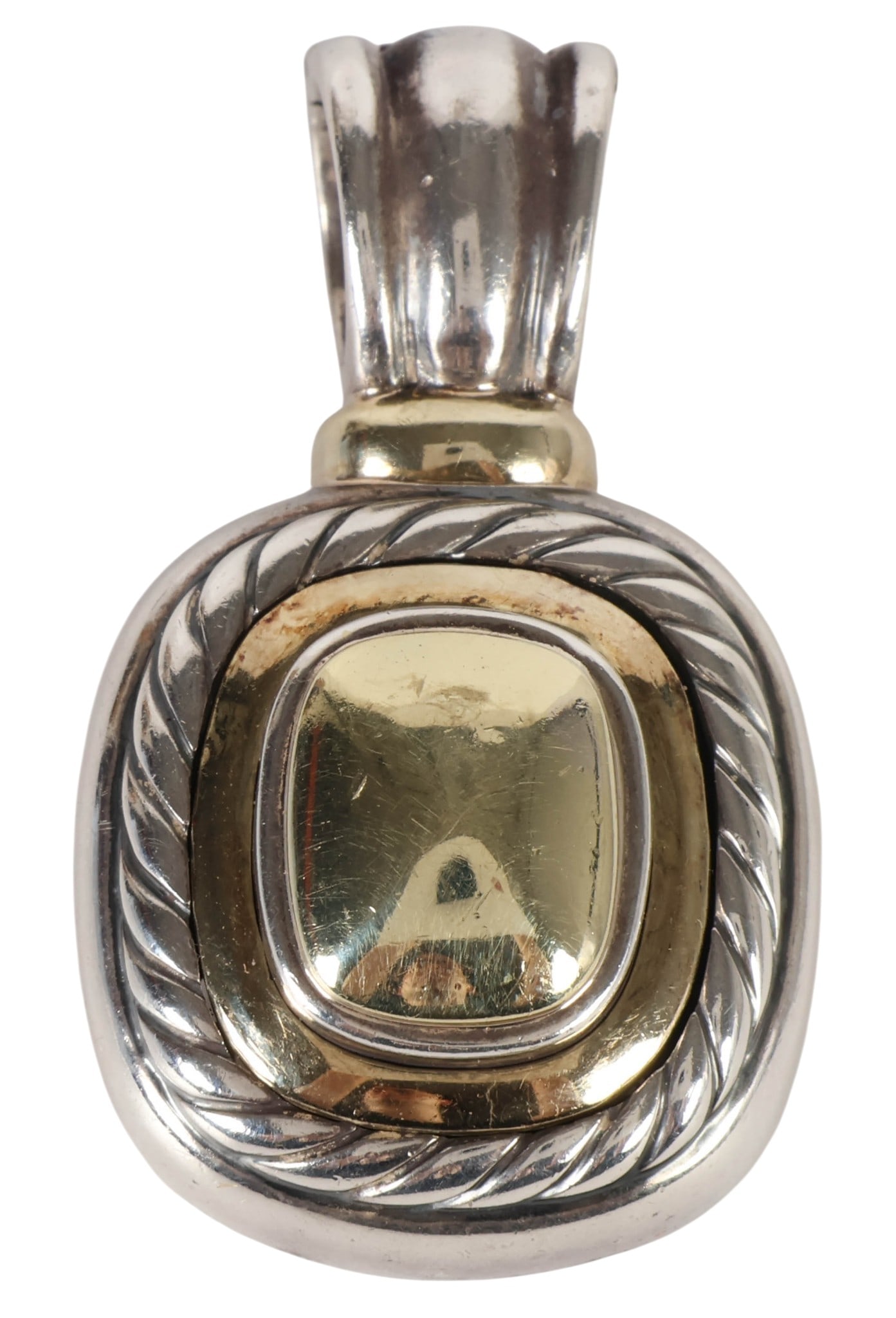 David Yurman Sterling Silver & 14k Albion Pendant: David Yurman Albion sterling silver pendant with central 14K gold accent, featuring the makers signature cable motif and hinged opening design. Reverse displays an openwork heart motif with the Yurman
