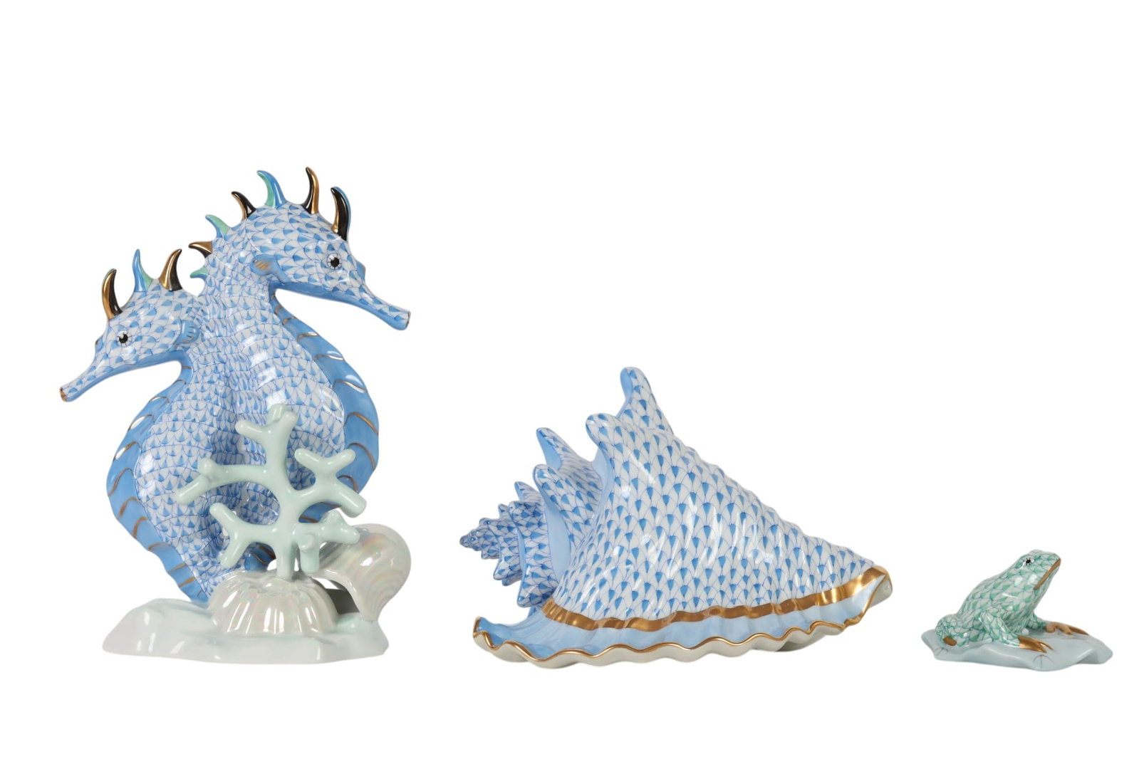 Herend Blue Seahorse Shell and Green Frog 3pc LOT: Lot of three Herend Hungary hand-painted porcelain figural decorative objects in the iconic fishnet pattern with gilt accents. The lot includes a blue seahorses mounted on an ocean floor base with cor
