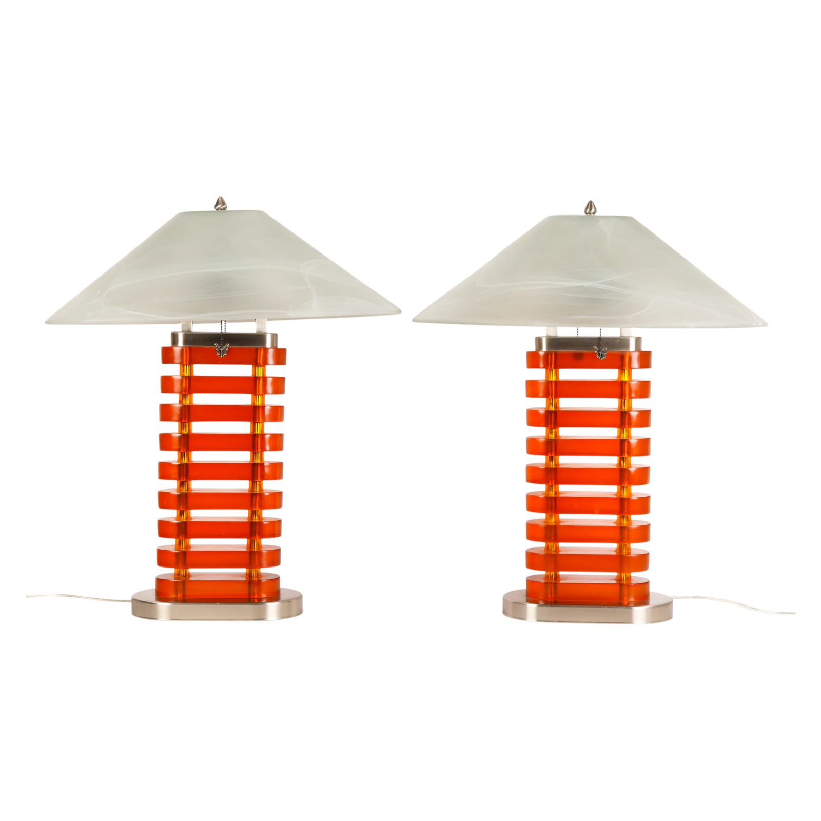 Post Modernist Pair of Stacked Amber Lucite Lamps: Pair of post modern table lamps featuring stacked amber lucite forms with brushed metal bases and accents. Sculptural design showcases layered translucent amber blocks forming a bold architectural pro