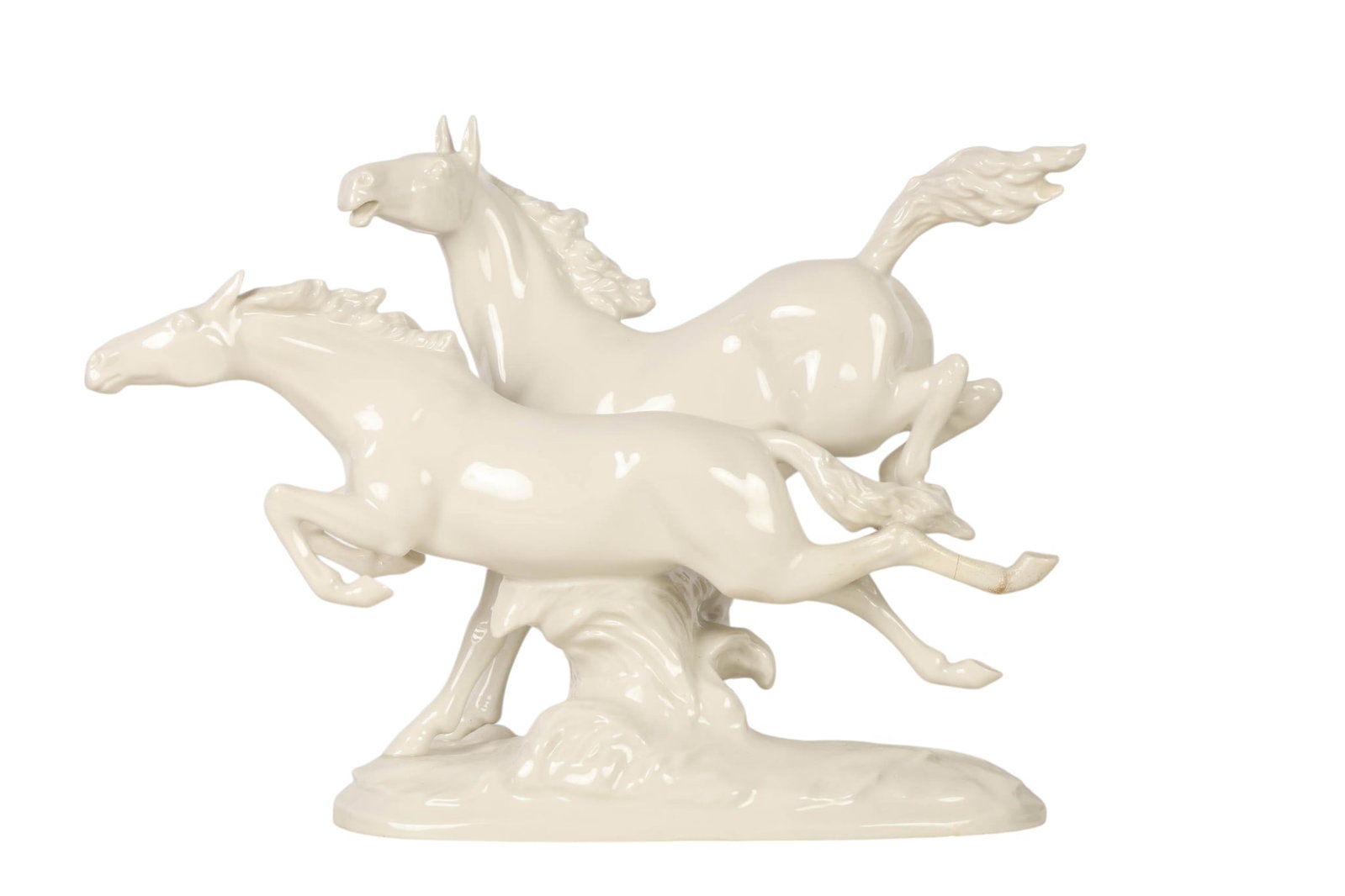 Hutschenreuther White Porcelain Horses Sculpture: Hutschenreuther Kunstabteilung porcelain figural group depicting two horses in full stride, modeled with dynamic movement and flowing manes, raised on a naturalistic oval base. Executed in a glossy