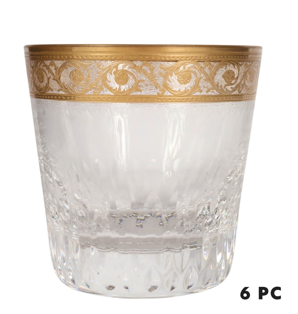 St Louis Crystal Thistle Whiskey Tumbler Glass 6pc: Set of six St. Louis Continental crystal whiskey tumblers, each featuring finely cut detailing and gilt scrolling foliate decoration to the rims. Maker's marks on bottoms. Dimensions: 3.25 X 3.25 X