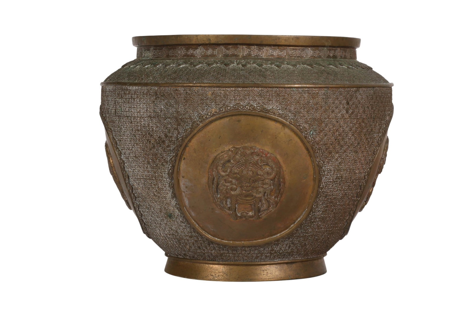 Chinese Style Antique Asian Bronze Planter Bowl: Antique Chinese style bronze planter bowl featuring a wide circular form with heavily textured geometric surface decoration and applied relief medallions depicting mythological creatures, including dr