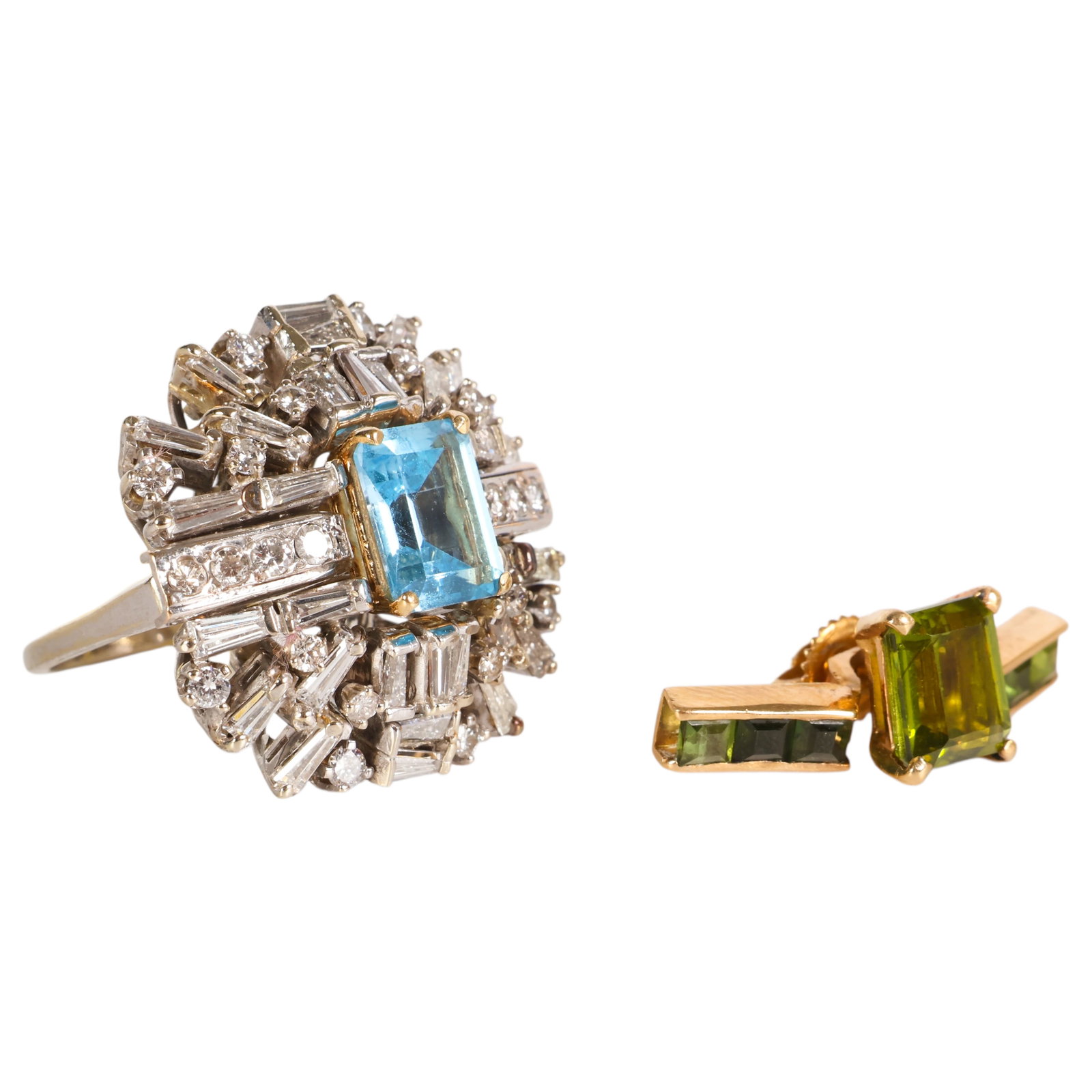 14K Diamond Topaz Peridot Interchangeable Ring 13g: Vintage 14K white gold interchangeable cocktail ring featuring an openwork setting accented with approximately 1.50 CTTW of round and baguette-cut diamonds. The ring includes two interchangeable cente