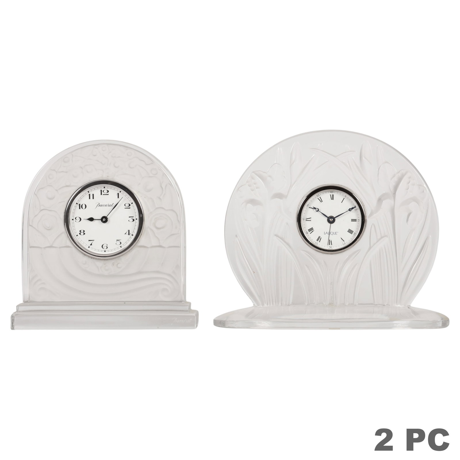 Baccarat and Lalique Crystal Desk Clocks 2pc LOT: Lot of two luxury designer crystal desk clocks comprising a Baccarat crystal mantel clock in the "Basket of Abundance" pattern and a Lalique France "Iris" table clock featuring clear and frosted cryst