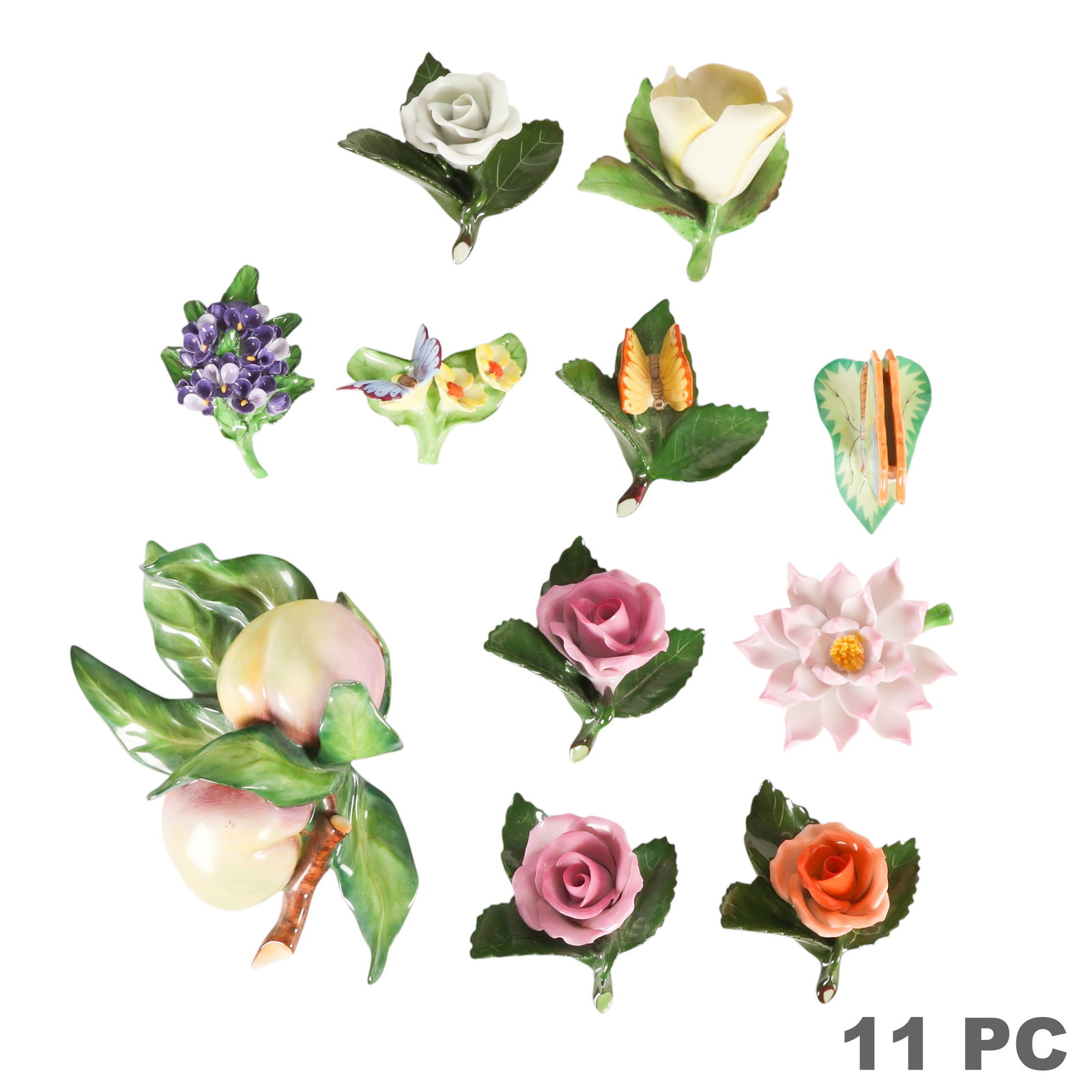 Herend Hungarian Porcelain Flower Figures 11pc LOT: Herend Hungary collection of eleven hand-painted porcelain floral and nature-form figurines. The group includes a pair of peaches, four roses in assorted colors, a lotus blossom, a yellow flower, a pu