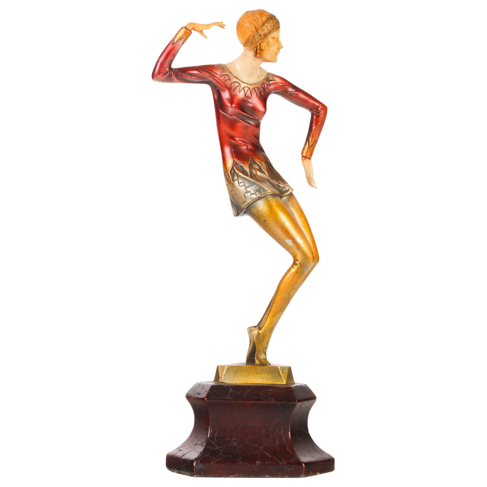 Art Deco Figural Lady Dancer Bronze Type Sculpture: Art Deco dancer bronzed metal sculpture depicting a stylish female figure in a dynamic dancing pose, dressed in a fitted burgundy and gilt costume with geometric decoration characteristic of the Art D
