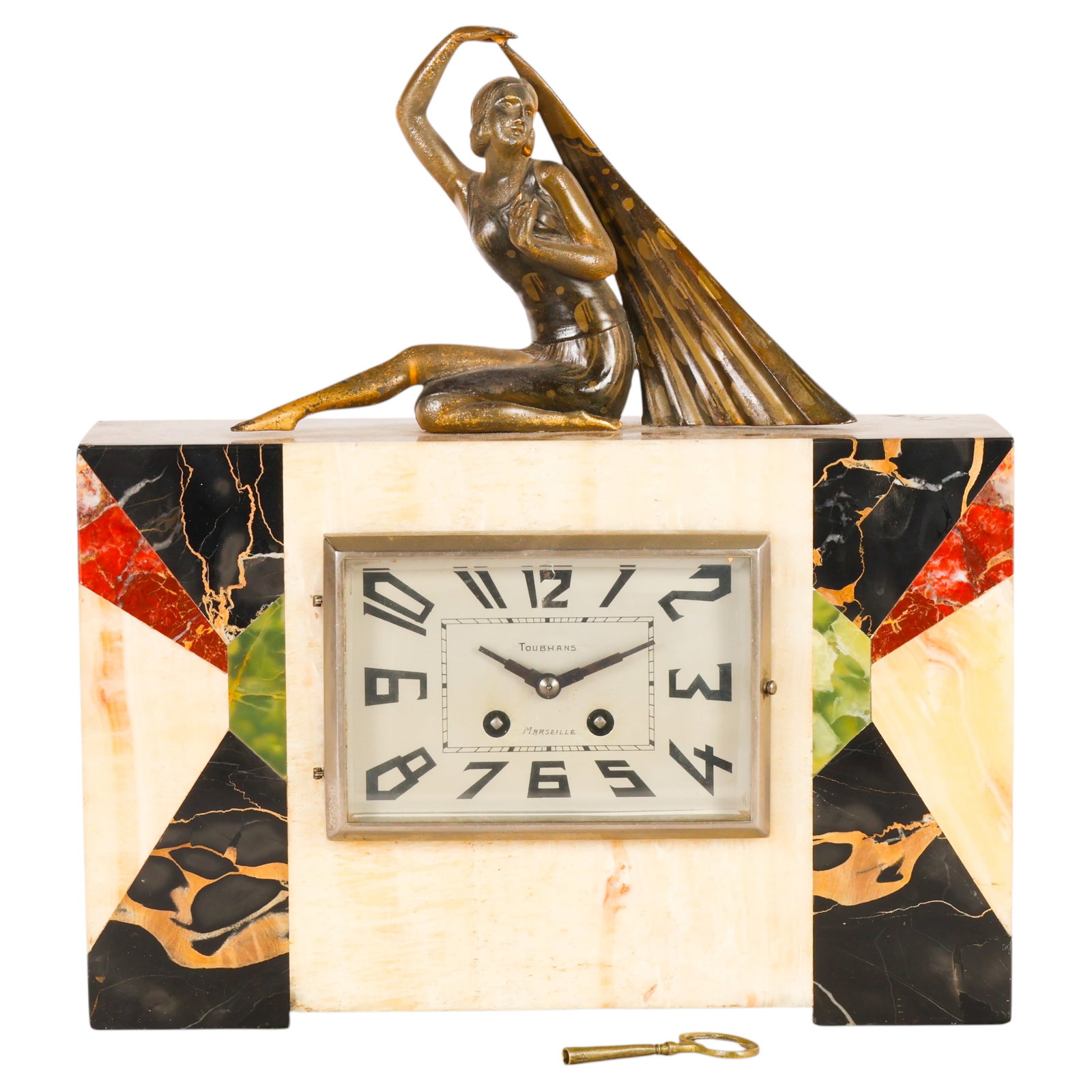 Antique French Art Deco Marble Bronze Mantel Clock: French Art Deco mantel clock featuring a polychrome marble case with geometric inlaid marble decoration and surmounted by a patinated bronze figural sculpture of a reclining dancer in the manner of De