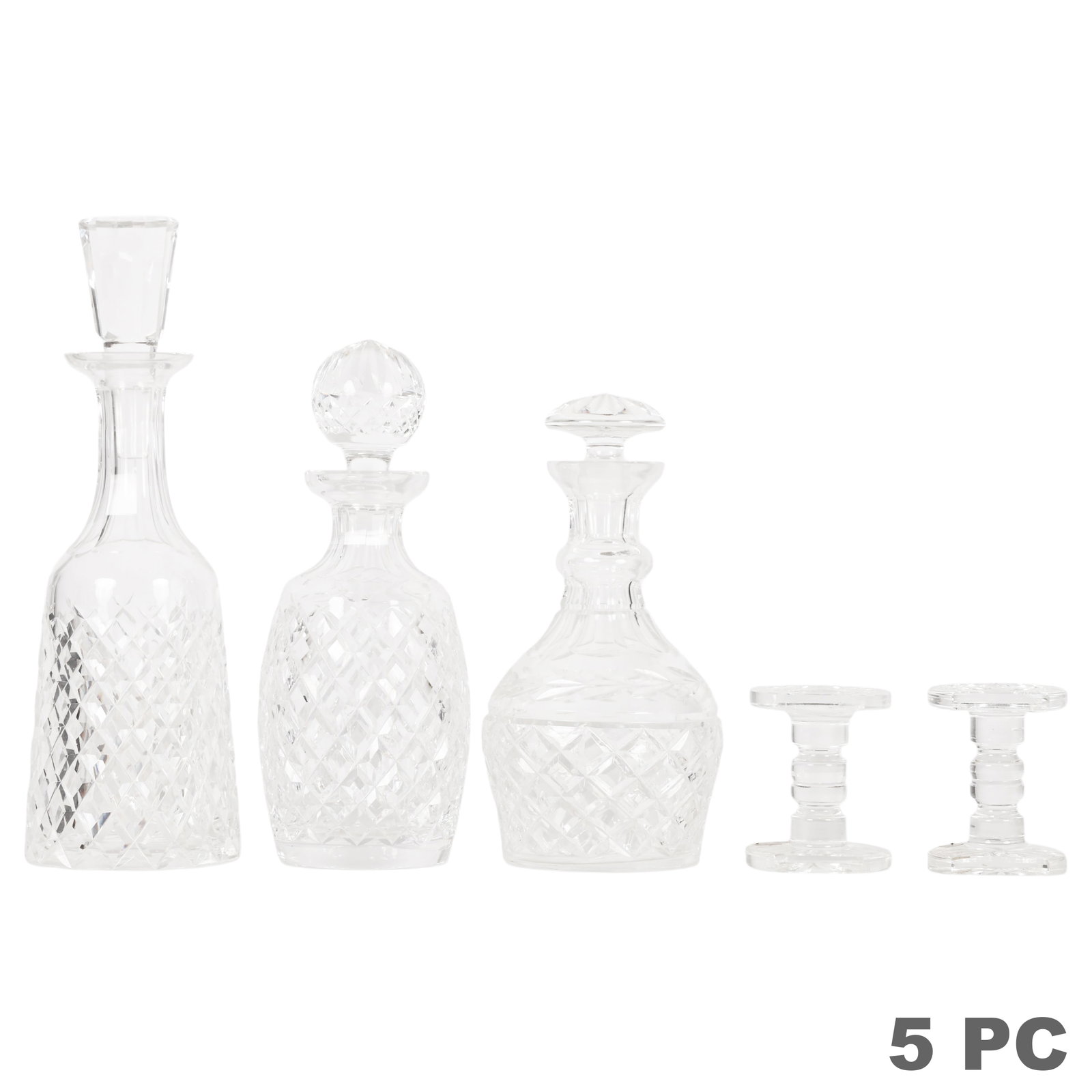 Waterford Irish Crystal Decanter & Knife Rest LOT: Waterford Irish Crystal five-piece group comprising three decanters with stoppers in the Alana pattern and two knife rests. Featuring Waterford's signature diamond-cut crosshatch design in clear cryst