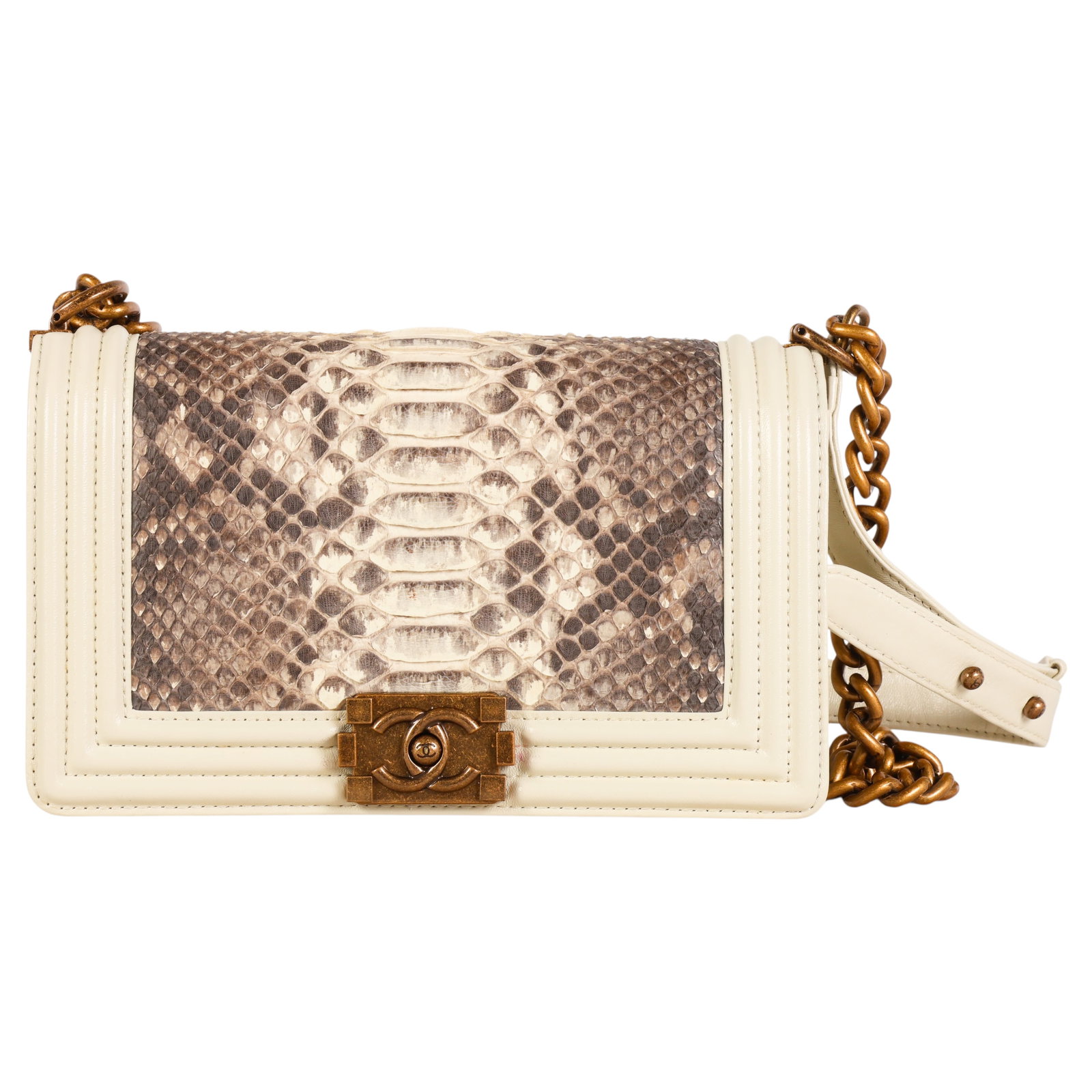 Chanel Cream and Taupe Python Old Medium "Boy Bag": Chanel French luxury designer Boy Flap shoulder bag featuring a natural python skin front flap panel with off-white leather trim and body. The bag is accented with antiqued gold tone Boy clasp hardwar