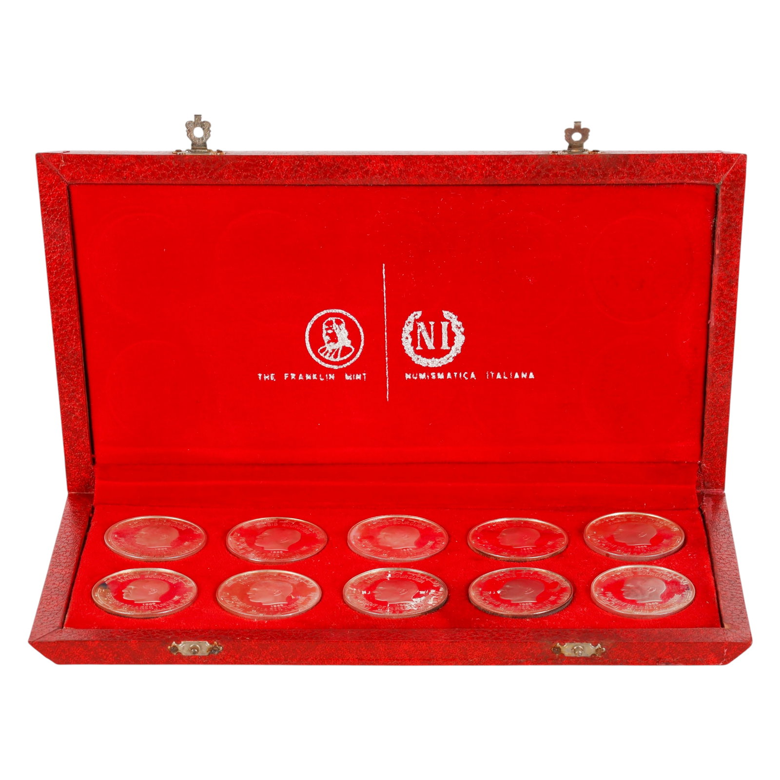 Republic of Tunisian Sterling Coin Proof 10pc SET: Republic of Tunisia proof silver coin set comprising ten sterling silver one-dinar proof coins issued in 1969 and presented in the original fitted red leatherette presentation case. Produced by The Fr