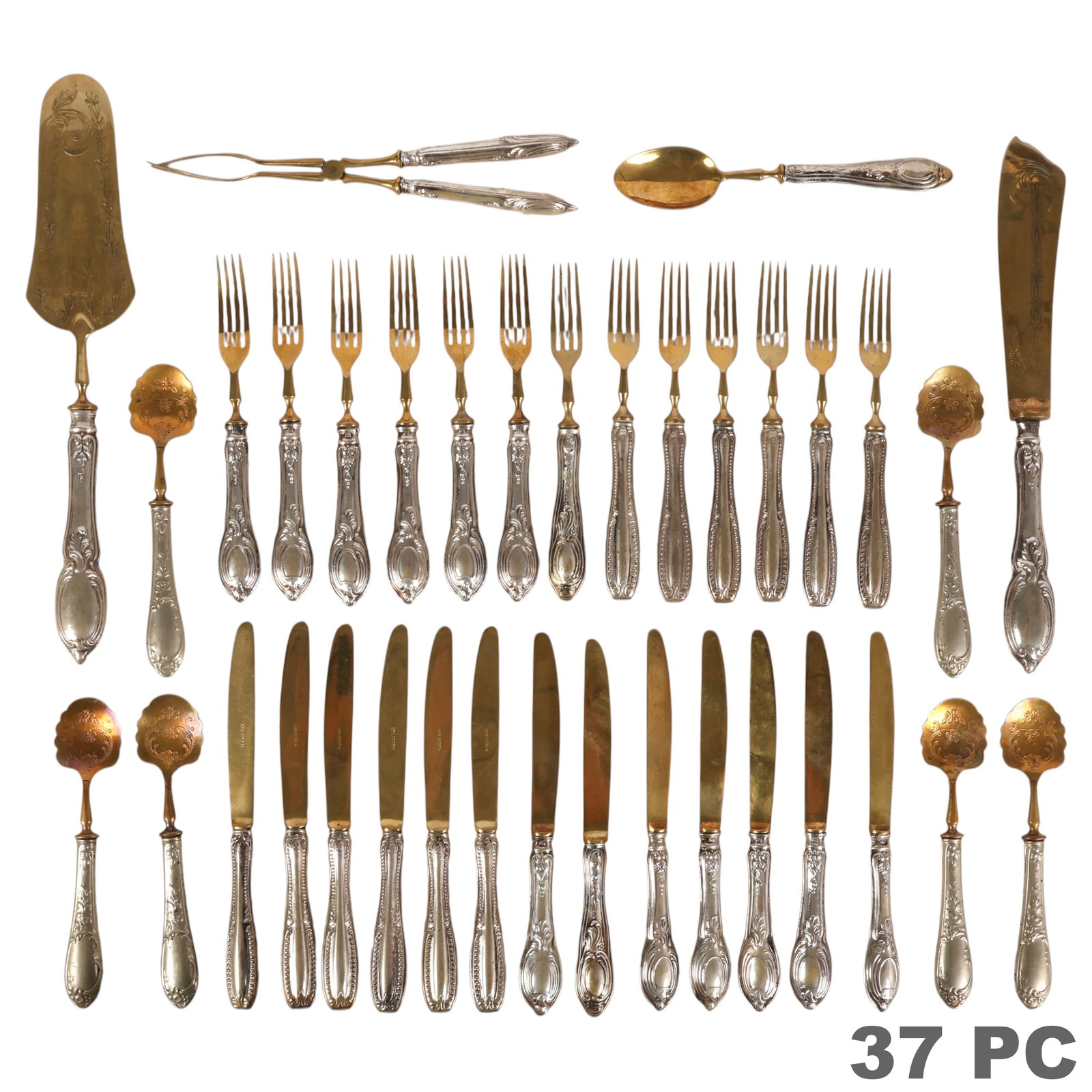 Continental 800 Silver and Brass Flatware 37pc LOT: Continental .800 silver and brass 37 piece hors d'oeuvre and luncheon flatware lot comprising two coordinating but distinct patterns. The first service includes six forks measuring approximately 6 inc
