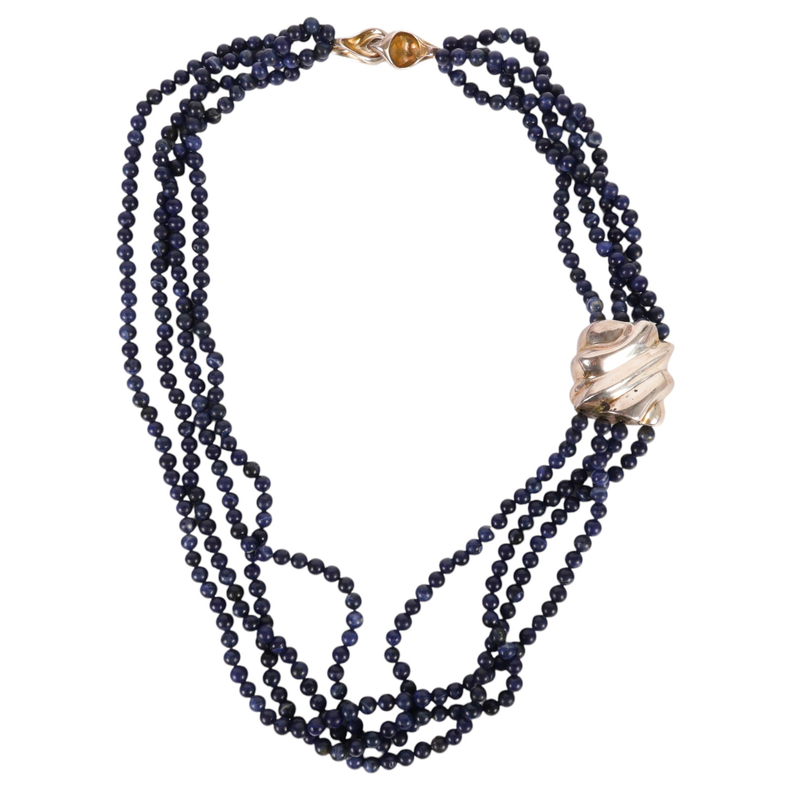 Sterling Silver Lapis Lazuli Multi-Strand Necklace: Sterling silver and lapis lazuli vintage multi-strand necklace featuring four strands of graduated round lapis lazuli beads in deep cobalt blue hues. The strands are joined by a substantial sterling s