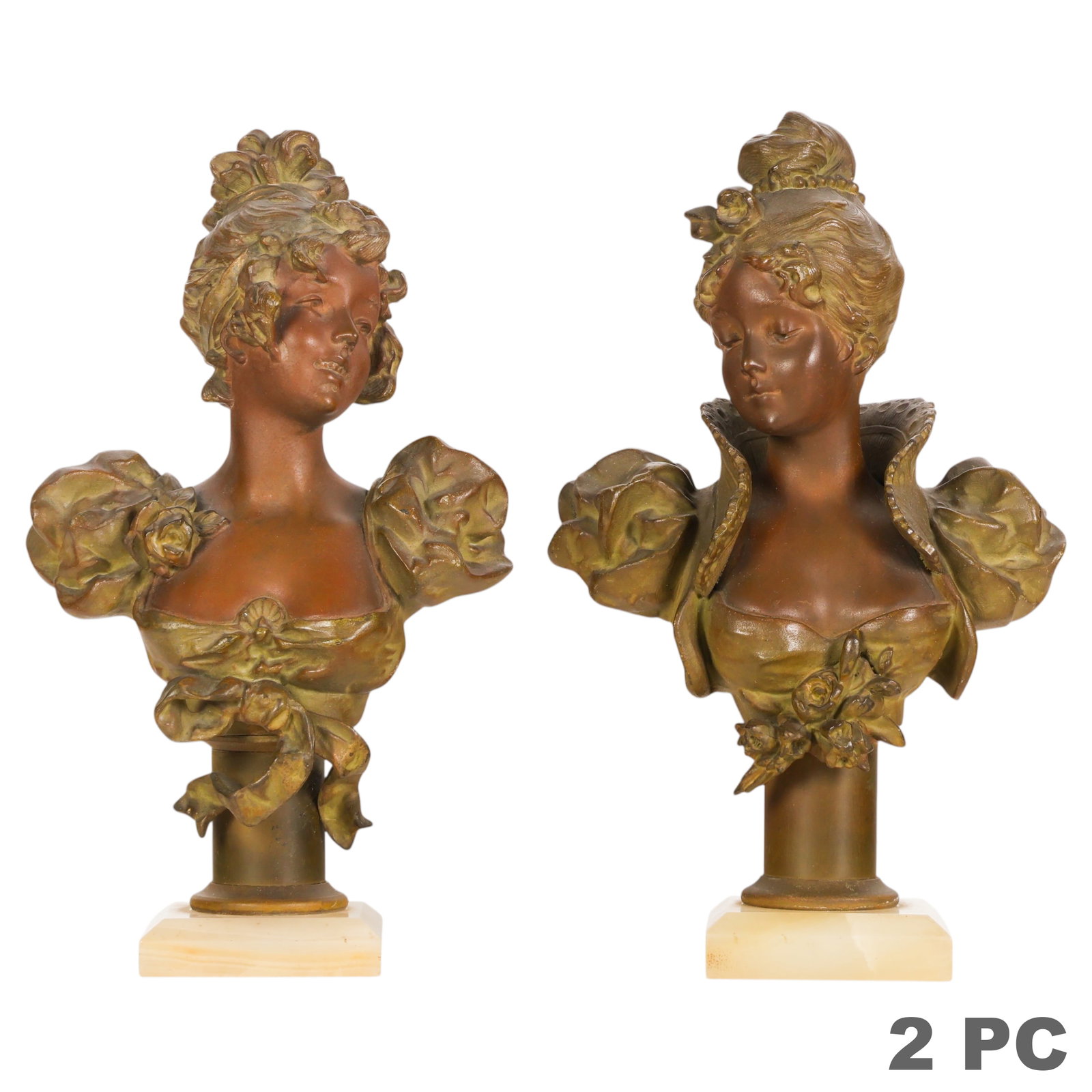 Antique French Art Nouveau Pair of Bronze Busts: French Art Nouveau style pair of patinated bronze busts depicting elegant young women in period dress, each adorned with floral accents and elaborate coiffures. One figure is modeled with a high lace 