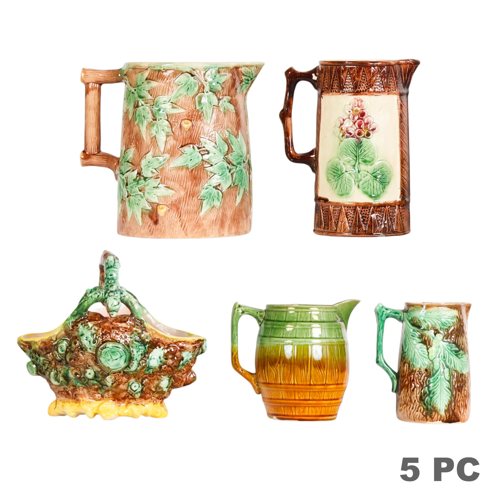 Majolica Basket Pitcher Vase Vessel & MORE 5pc LOT: Majolica five piece vintage pottery lot comprising four handled pitchers and one basket form centerpiece. The group includes a large tree bark and ivy motif pitcher, a barrel form pitcher with green a